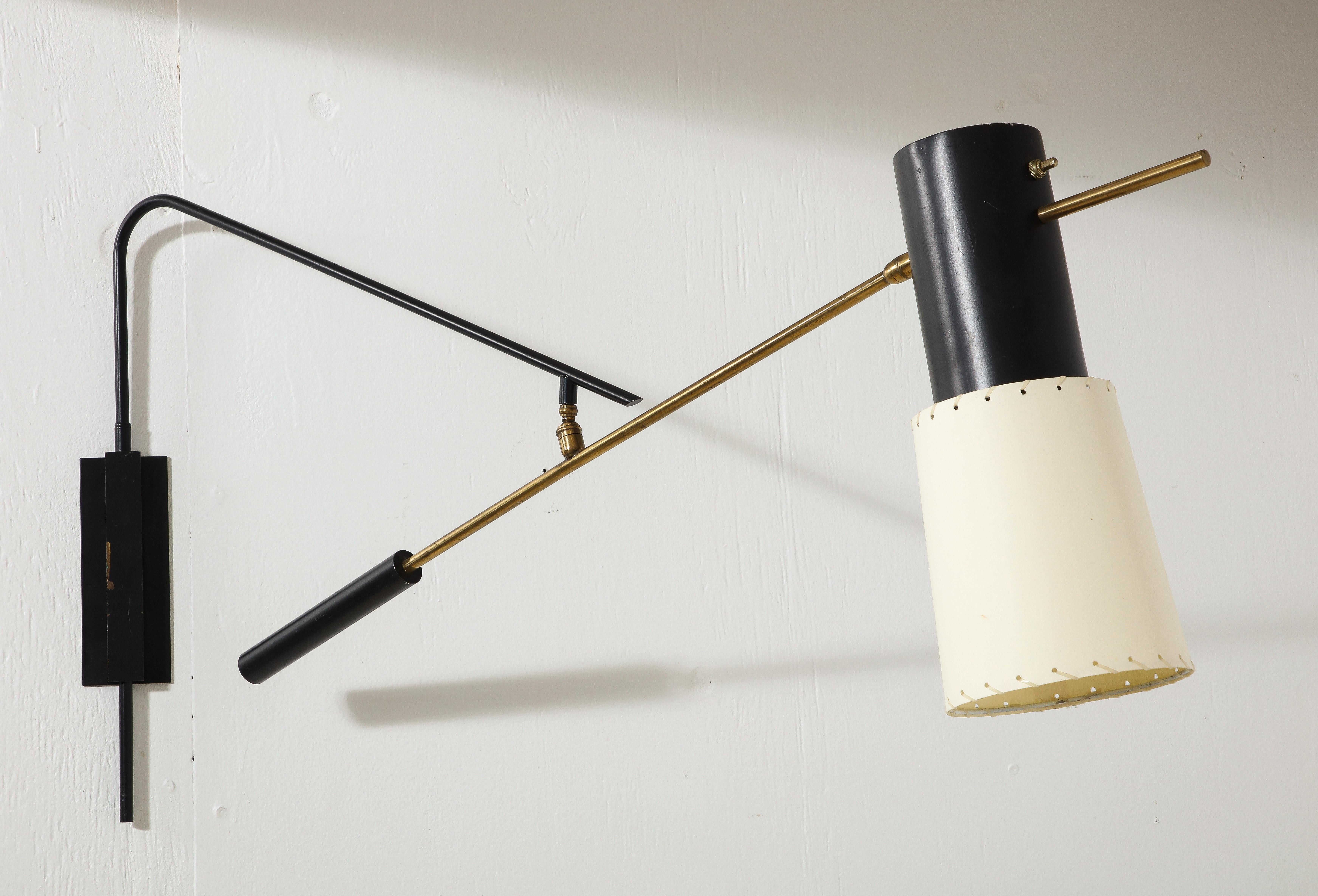 Large Arlus Black and Brass Double Swing Arm Sconce. Exceptional scale and a very dynamic design.
