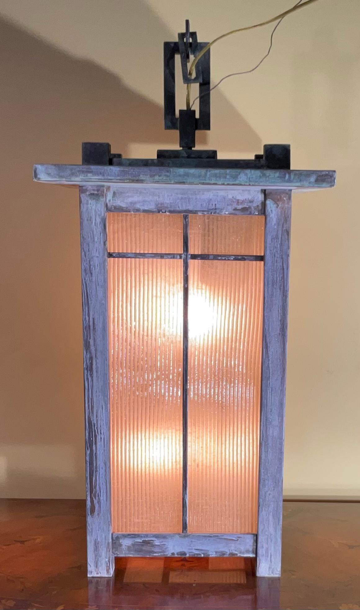 Quality handmade of solid copper art and craft hanging lantern with four 60 watt lights, four side art glass.
Made in the US .
Could be used in wet location and indoor.
 