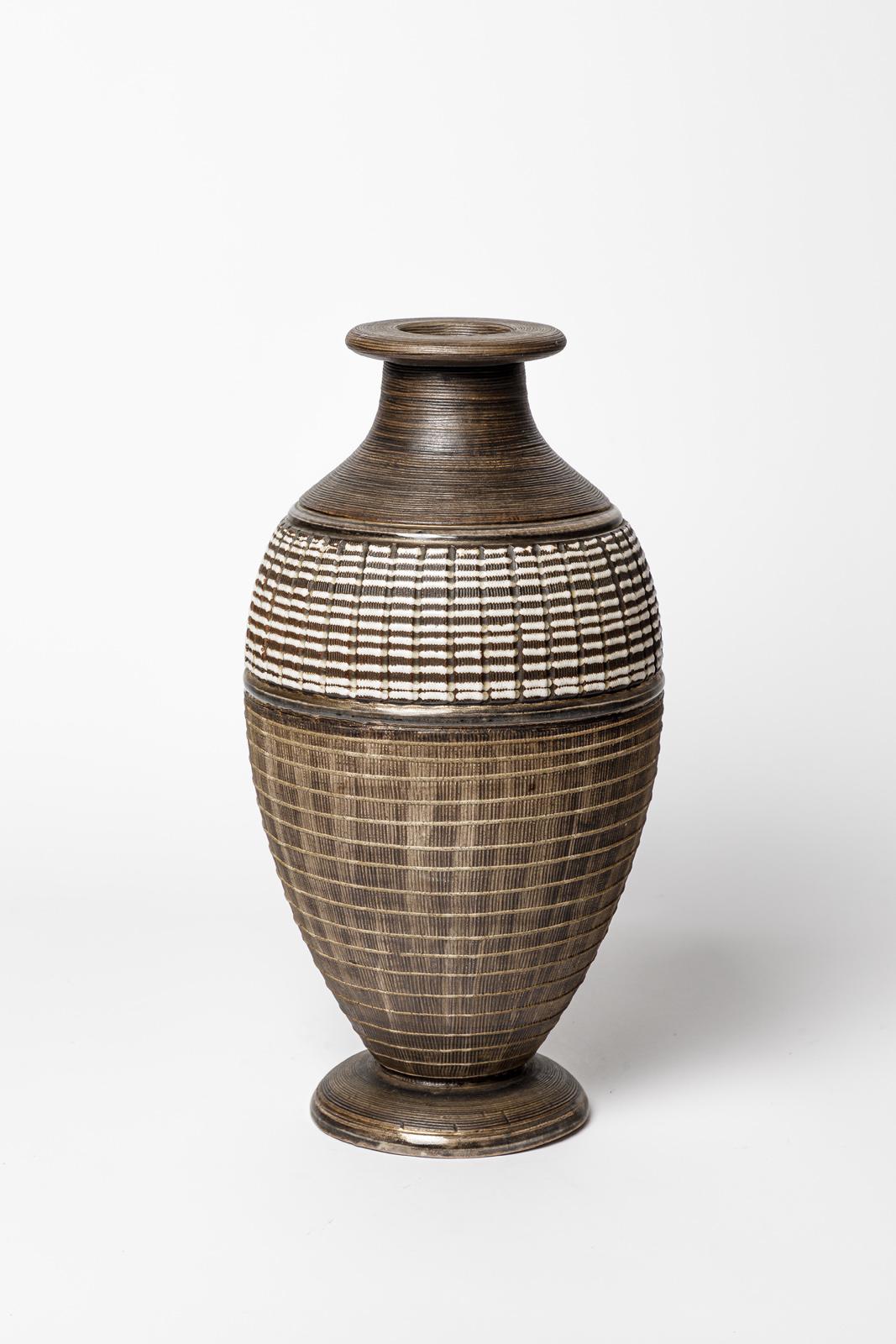 Lucien Brisdoux

Circa 1930

Large art deco 20th century ceramic vase

Original perfect condition

Signed under the base

Height 34 cm
Large 16 cm