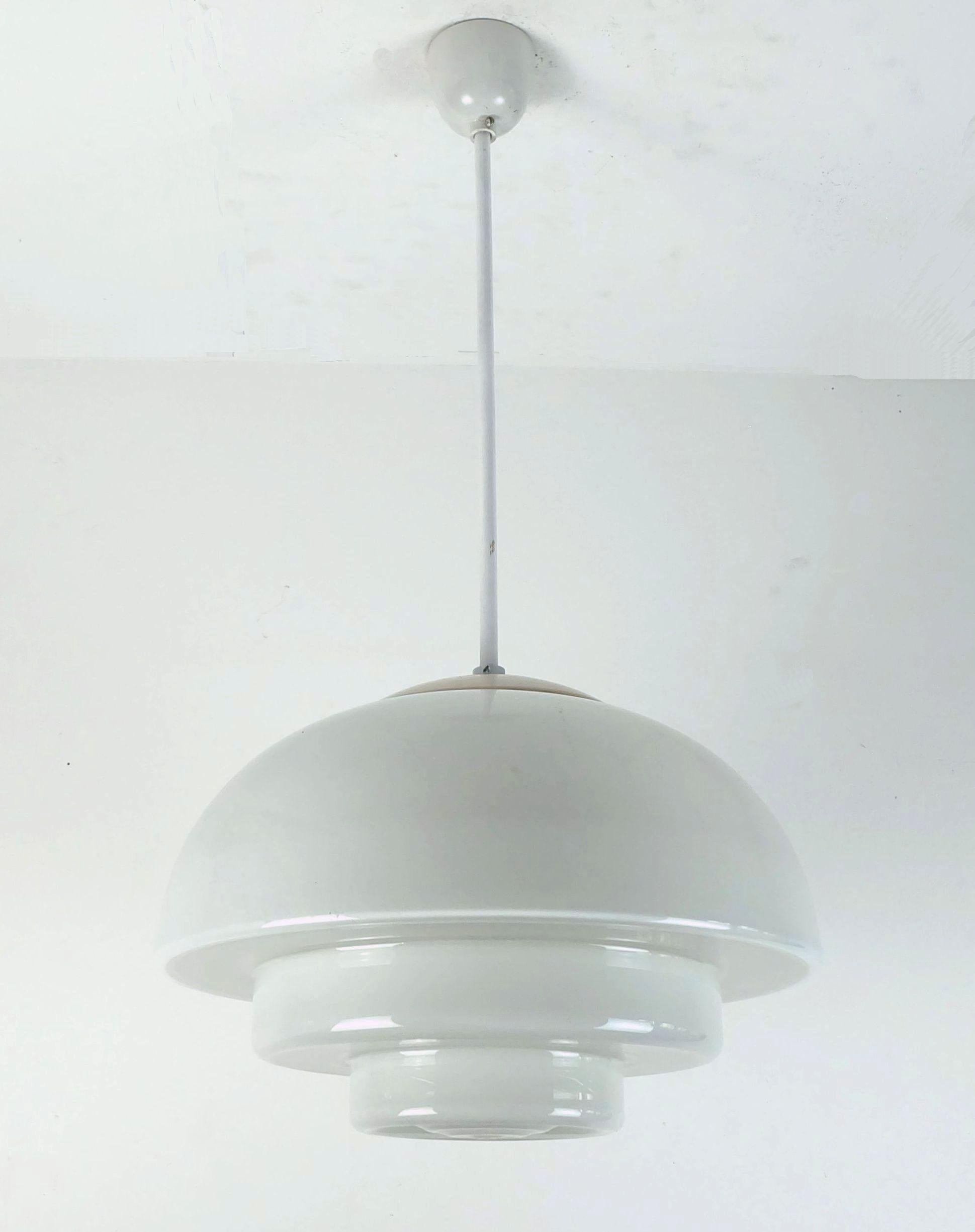 Pendant lamp from the 1930s. Manufacturer: Mithras-Leuchten Sächsische Glasfabrik August Walther & Söhne, Radeberg near Dresden and Ottendorf-Okrilla in Saxonia. The lamp was produced from 1935 onwards. It features a large shade made of white