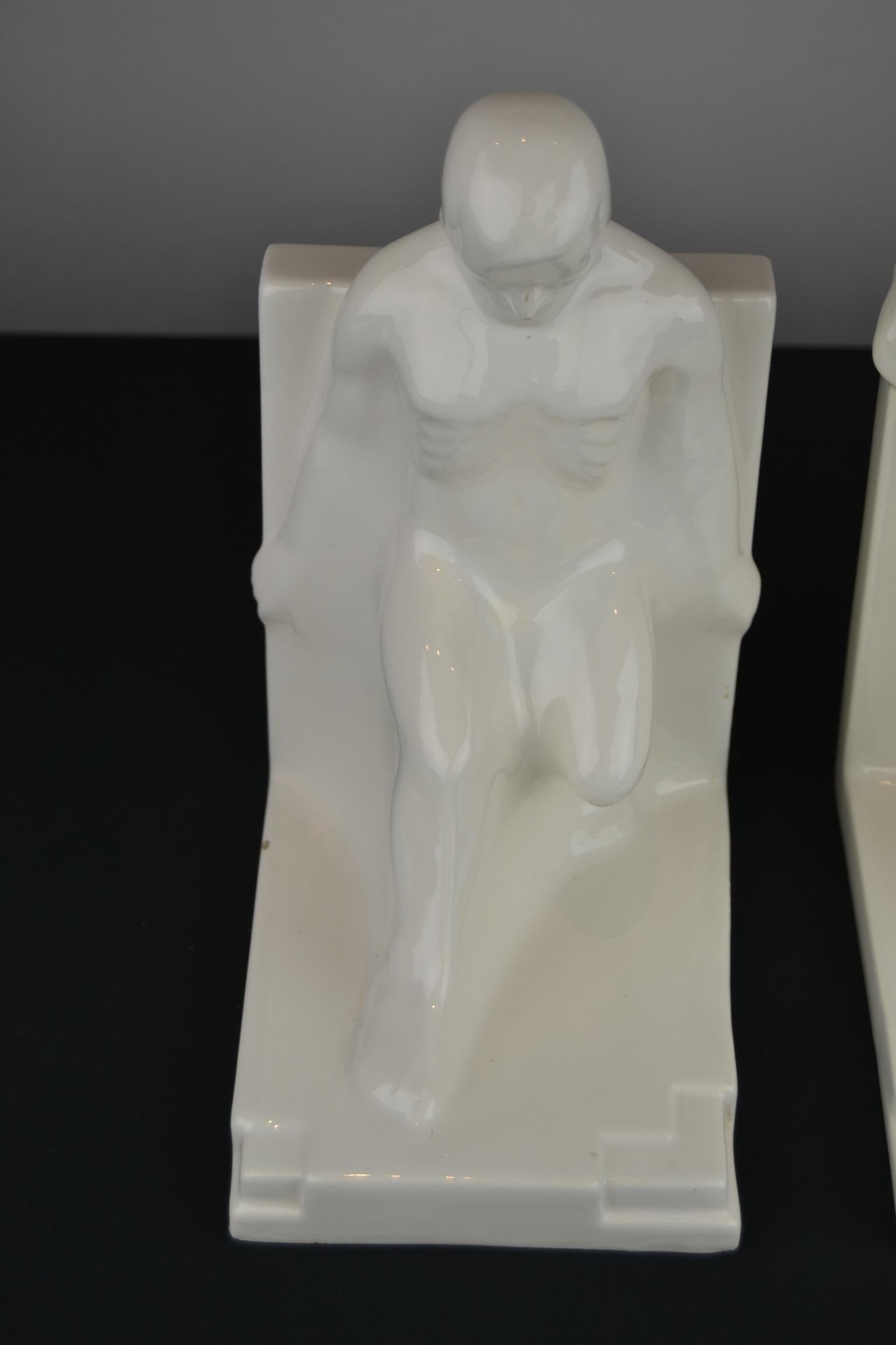 Dutch Large Art Deco Bookends with Nude Muscular Males in White Glazed Ceramic