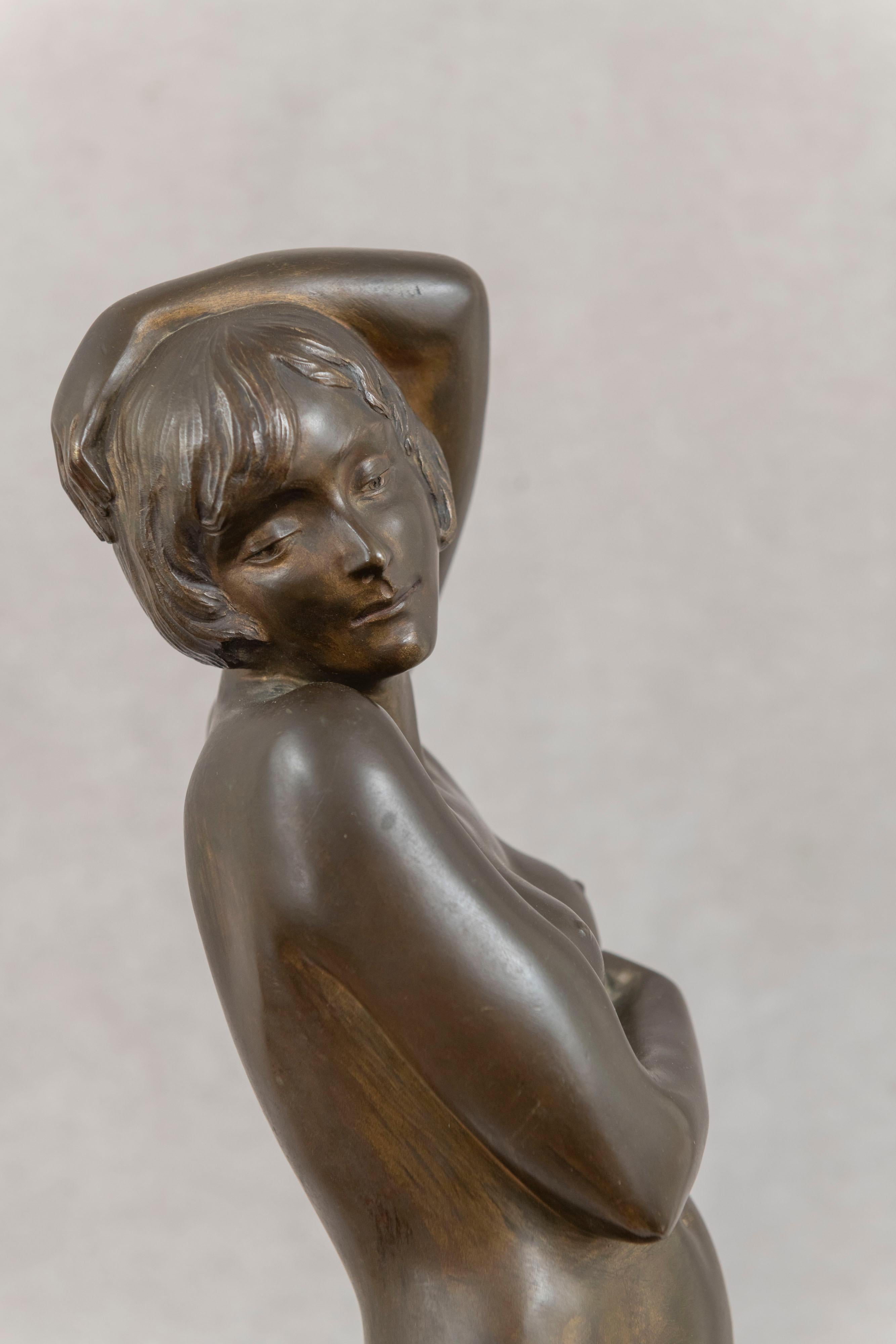 This large and impressive bronze nude is high style art deco. This is not your typical fare. Her pose suggests great vibrancy and sexuality. While unsigned we know it was done by Marie Louise Simard. To appreciate the full value of this sculpture,