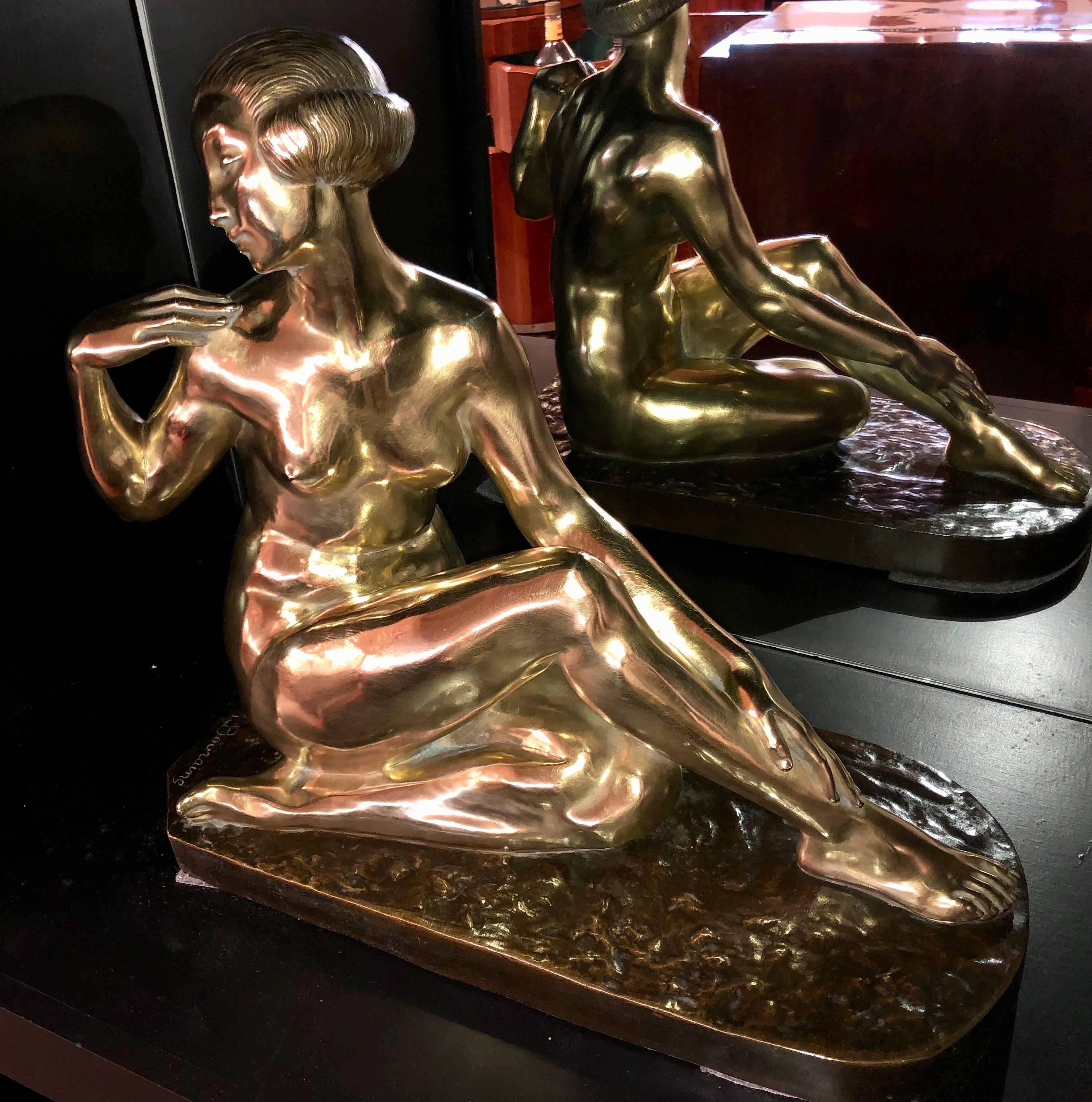 Powerful French Art Deco Bronze statue by important sculptor Marcel Bouraine. This stunning extra large bronze casting is very impressive (it appears twice the size of the largest bronzes in the shop). The shiny brass patina/finish gives this
