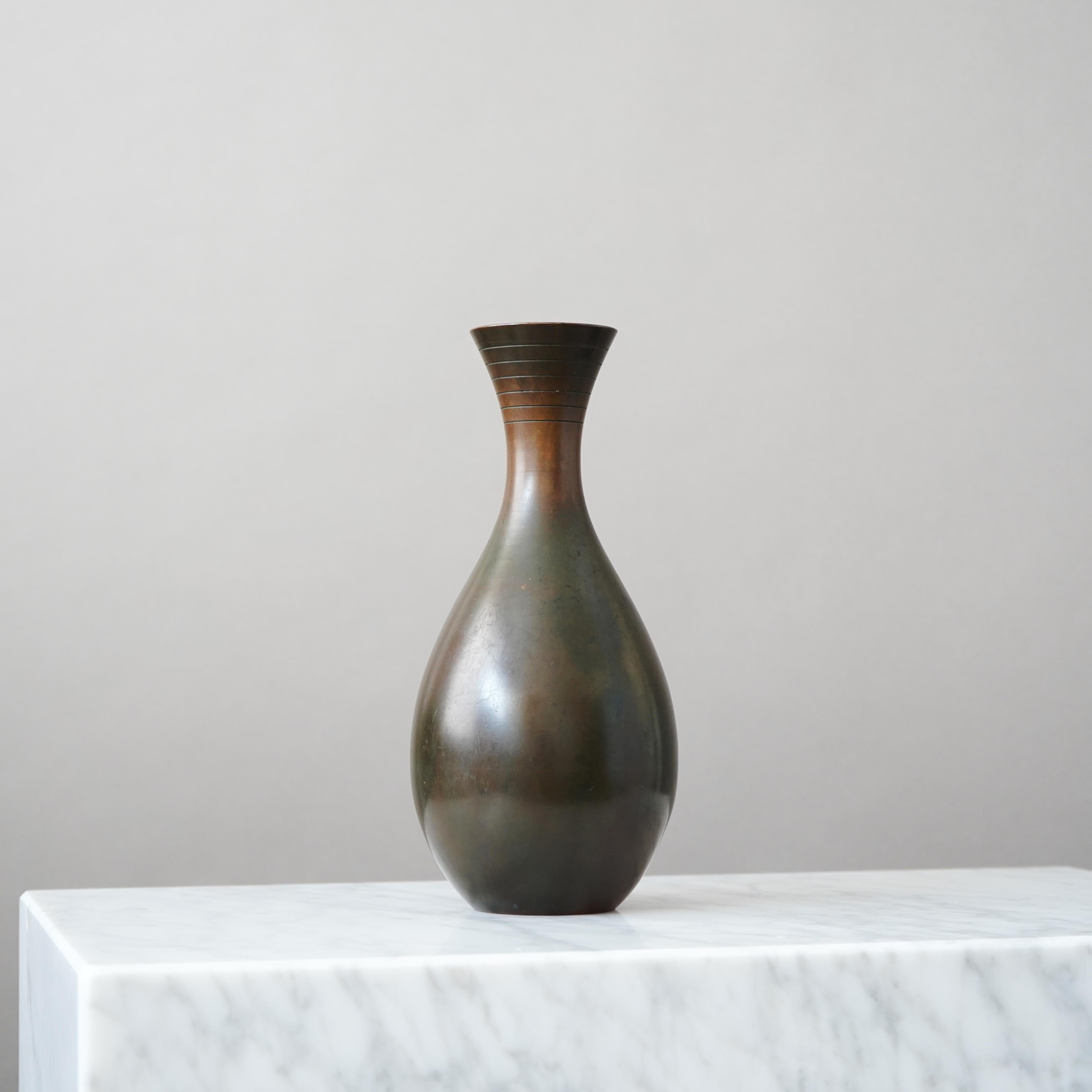A large and beautiful bronze vase with amazing patina. 
Made by GAB Guldsmedsaktiebolaget, Sweden, 1930s.  

Good condition, some light scratches and wear to the patination.
Stamped 'BRONS' and makers mark.

GAB was founded in Stockholm in 1867 and