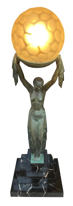 Large Art Deco bronze with lamp “Fayral” signed by Max le Verrier.
