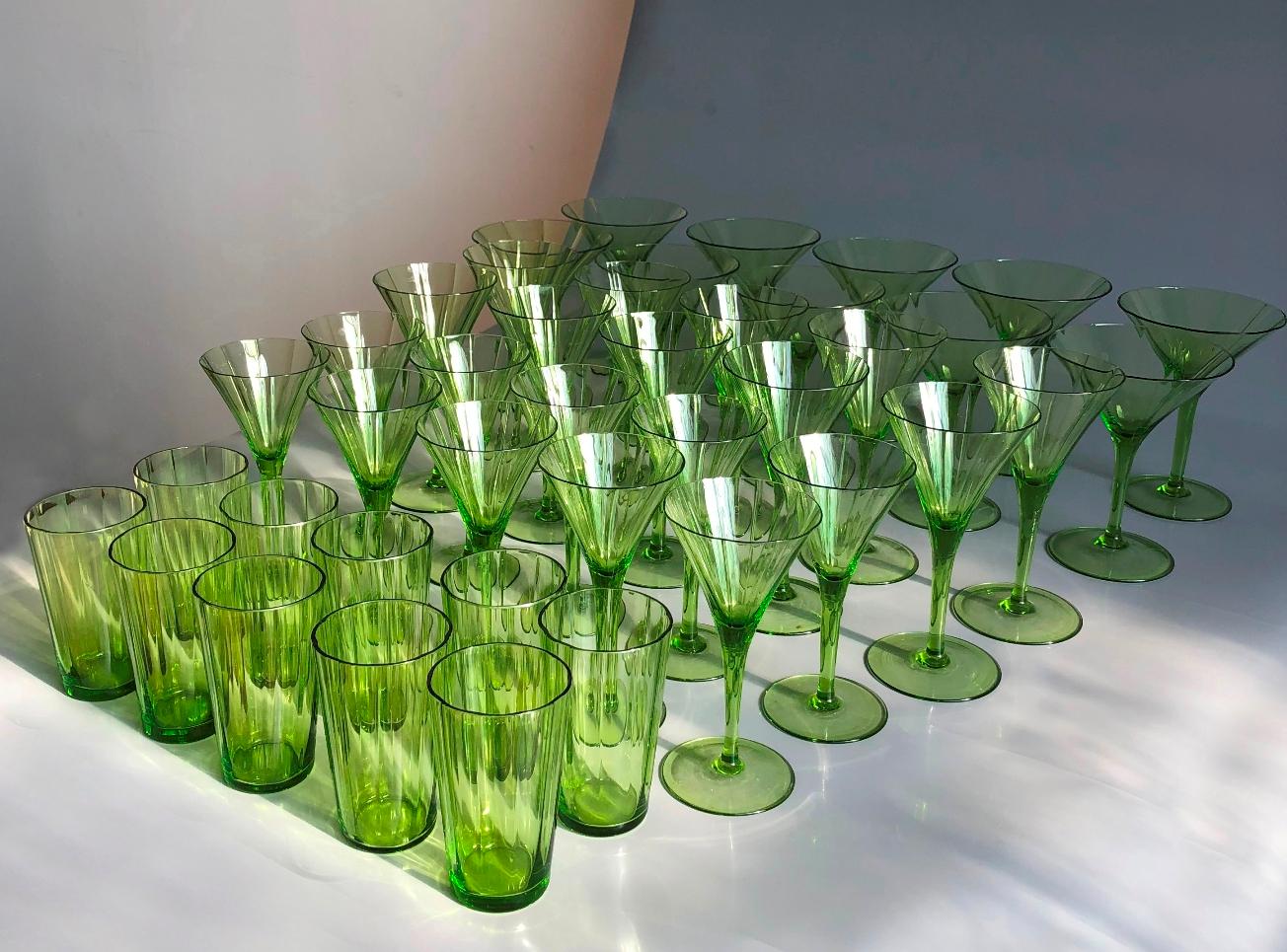 Austrian Large Art Deco Champagne&White&Red Wine&Water Set in Green Glass Austria, 1920s For Sale