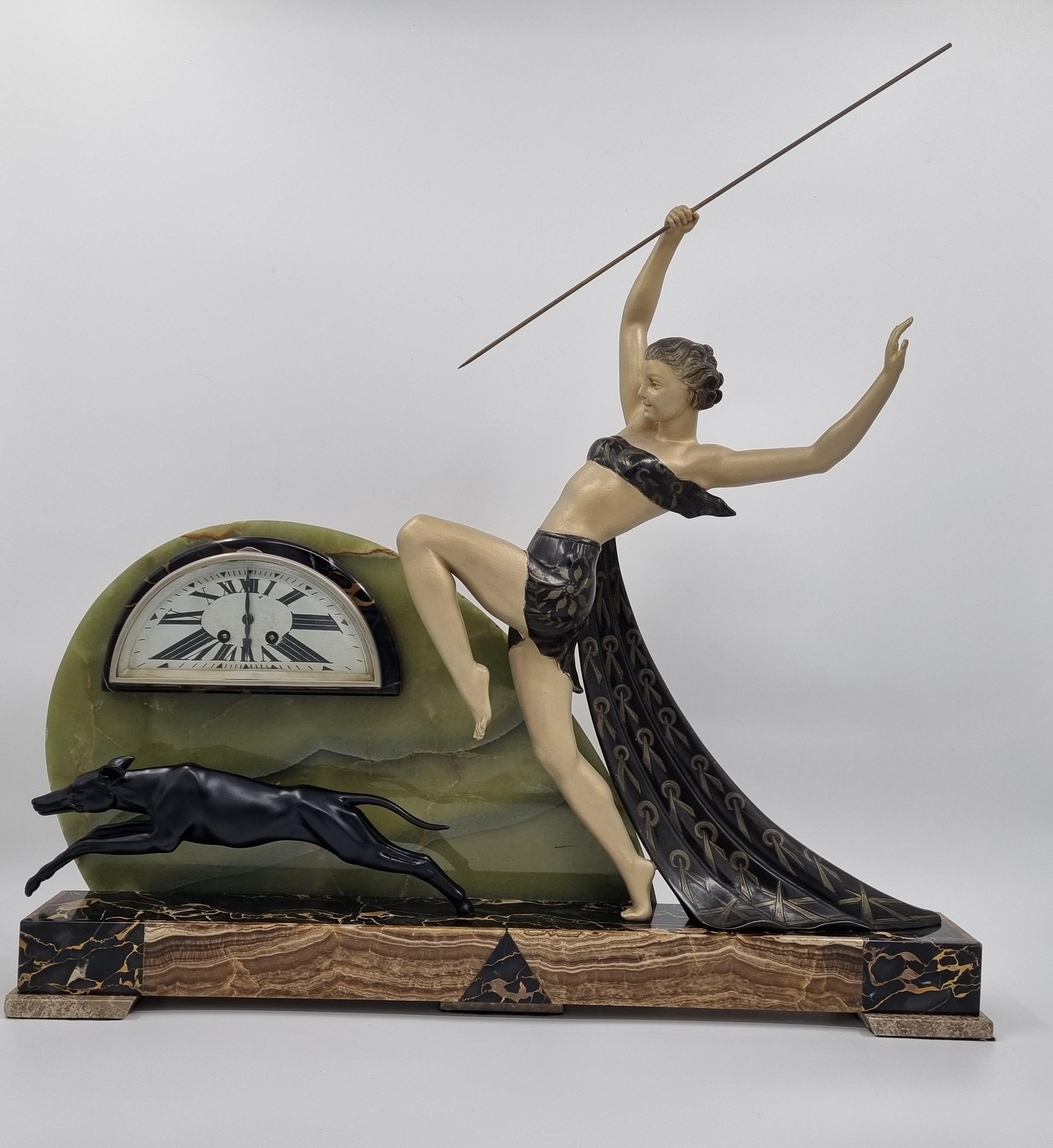 Diana the Huntress , Art Deco Clock Sculpture by the renowned French artist Limousin who was working in Paris during the 1920s -30s - signed to the back of the lady's cape. Streamlined , Art Deco , Geometric Design . In my opinion the pinnacle of