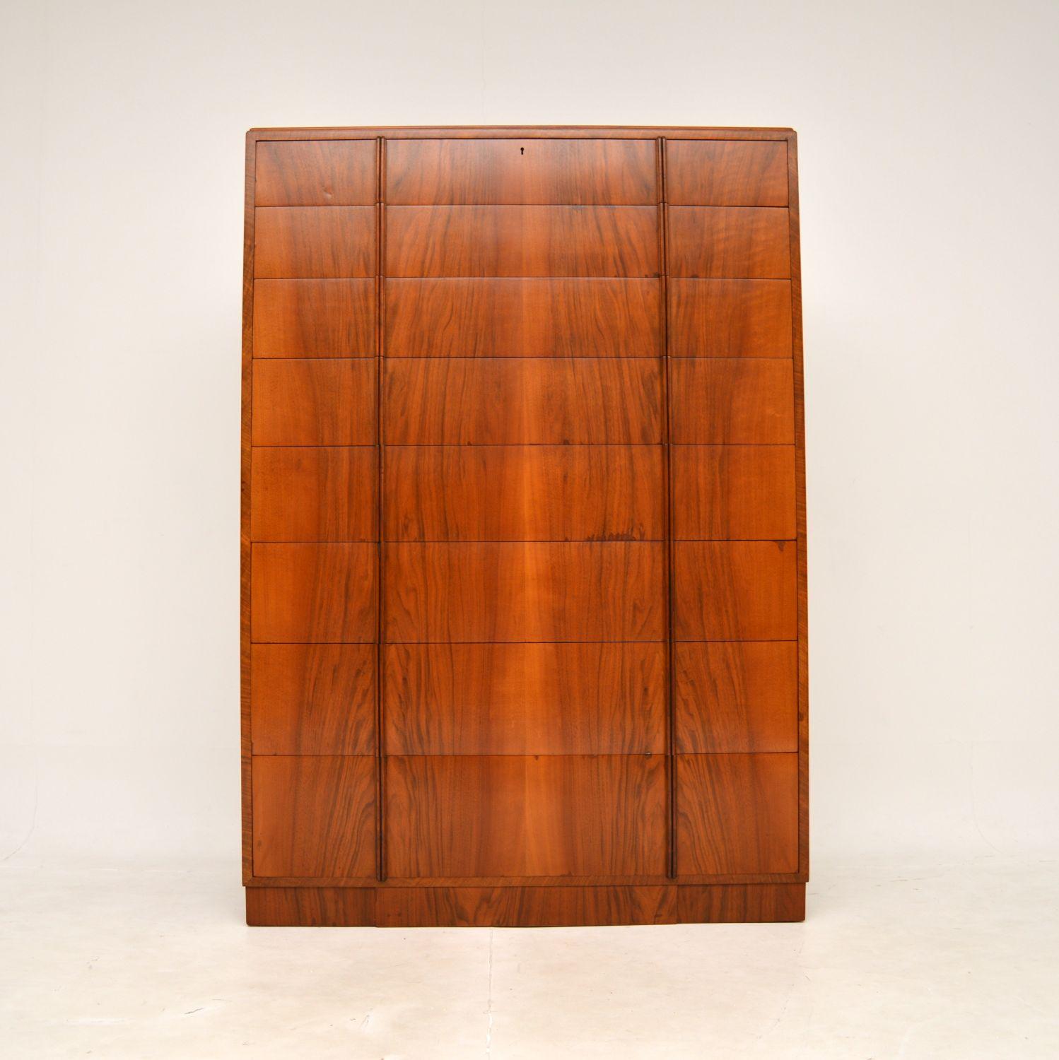 A stunning and very large Art Deco figured walnut chest of drawers. This was made in England, it dates from around the 1920-30’s.

This is one of the largest Art Deco chests we have ever seen, there is a huge amount of storage space in the eight