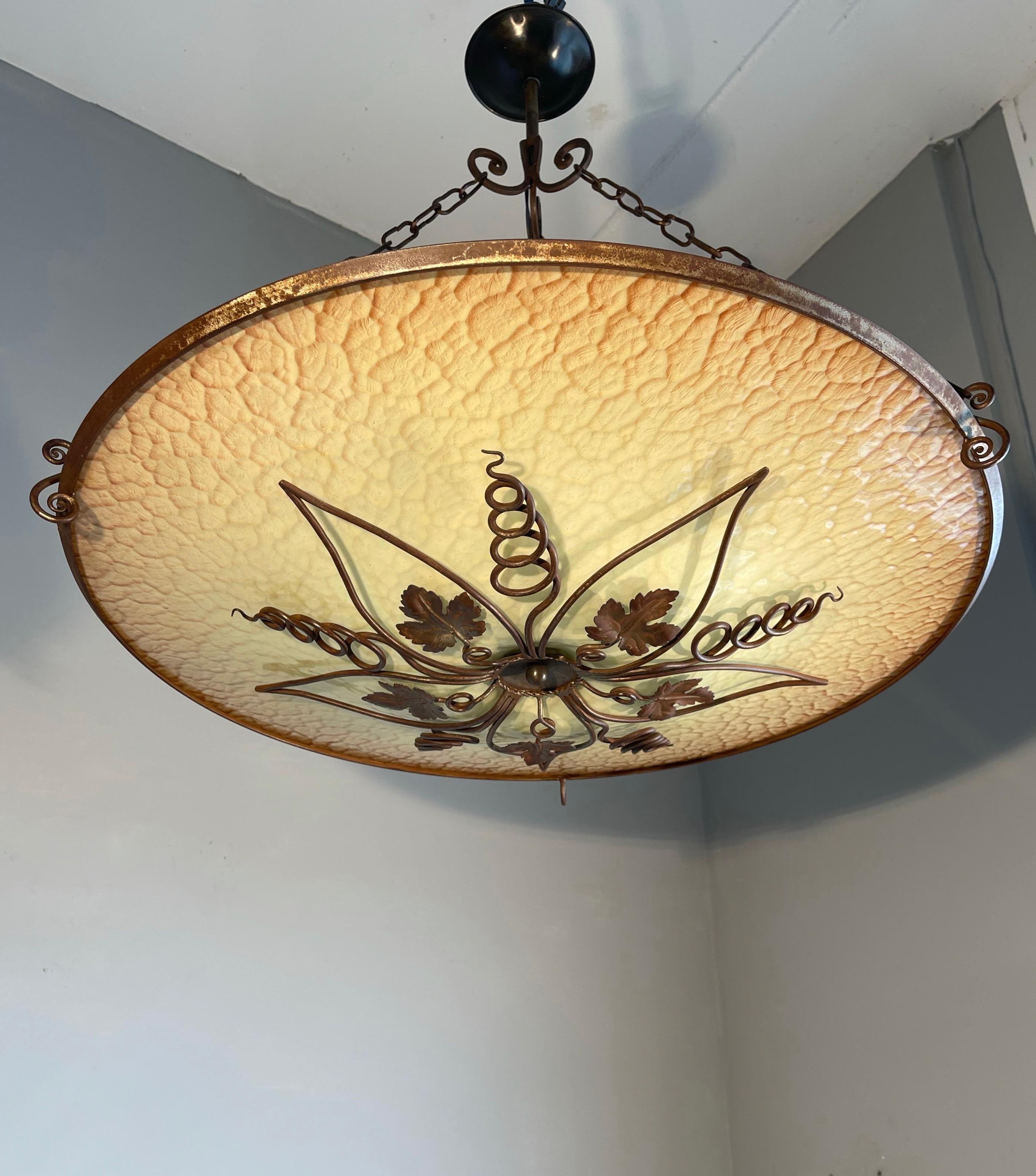 Excellent condition, Art Deco era, 3-light, wine theme pendant light.

If you are looking for a beautiful light fixture to decorate your room of interior then this handcrafted light fixture from the Dutch Art Deco era could be perfect for you. The