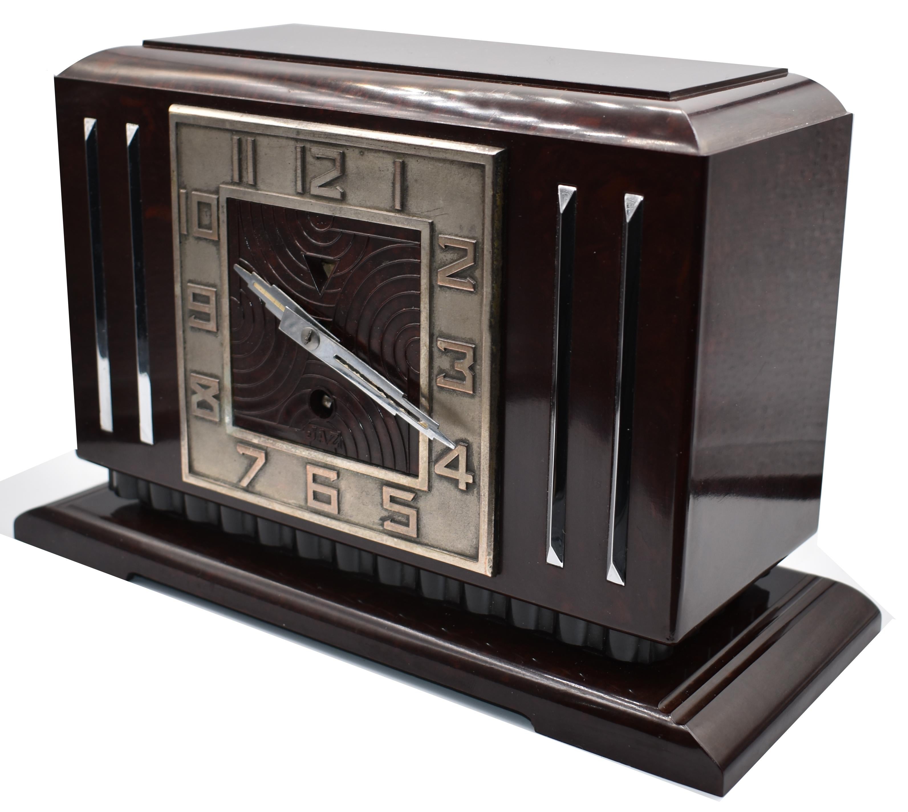 This is the daddy of true 1930s Art Deco clocks. Made in France by the very collectable JAZ company, this clock screams everything about the deco era we all love and admire, streamline, Industrial and modernist. The casing is a mottled deep red