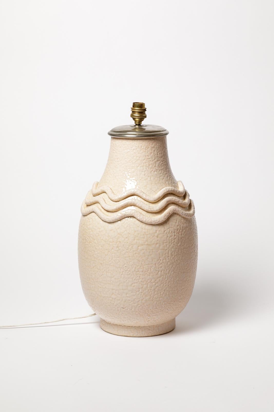 Kaza - France

Unique art deco large ceramic table lamp

Signed under the base

Original perfect condition

Height 40 cm
Large 20 cm

Height with electrical system 46 cm
