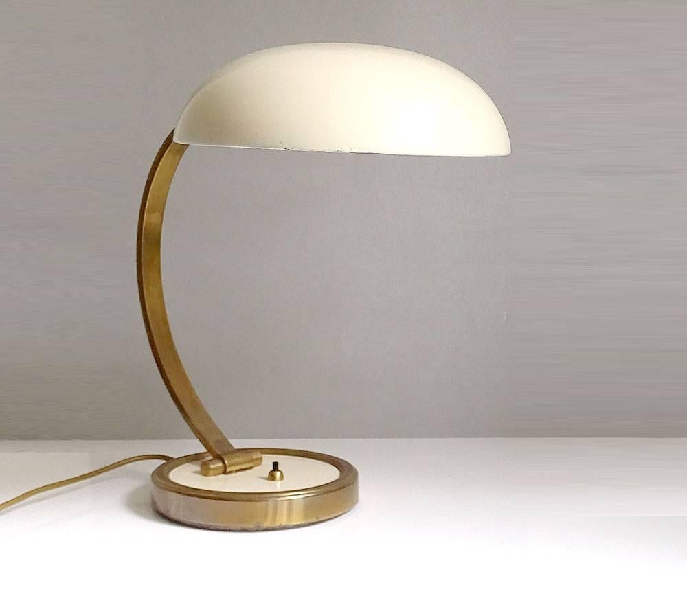 Large Art Deco Bauhaus / midcentury desk lamp, manufactured by the German company Gecos (Gebrüder Cosack, Company founded in 1847),

Beautiful solid (and heavy) all brass construction based on an original design by Christian Dell, the Bauhaus metal