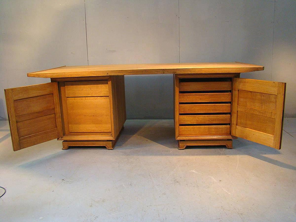 Large Art Deco oak desk in the style of Dominique, circa 1930-1940.