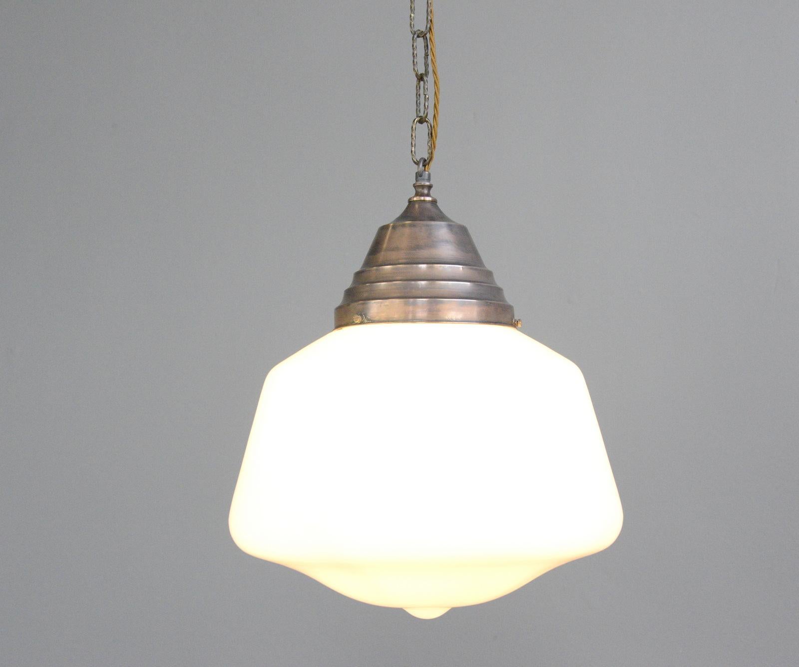 Large Art Deco opaline pendant light, circa 1930s

- Opaline glass
- Stepped copper gallery
- Takes E27 fitting bulbs
- Comes with 100cm of cable and ceiling rose
- Dutch ~ 1930s
- 35cm wide x 38cm tall

Condition Report

Fully re wired