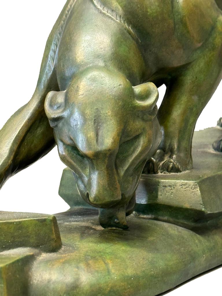 Large Art Deco Panther

During the Art Deco era, particularly in the 1920s and 1930s, numerous sculptures, including panther sculptures, were crafted from various materials, notably bronze. The Art Deco style was characterized by its clean lines,