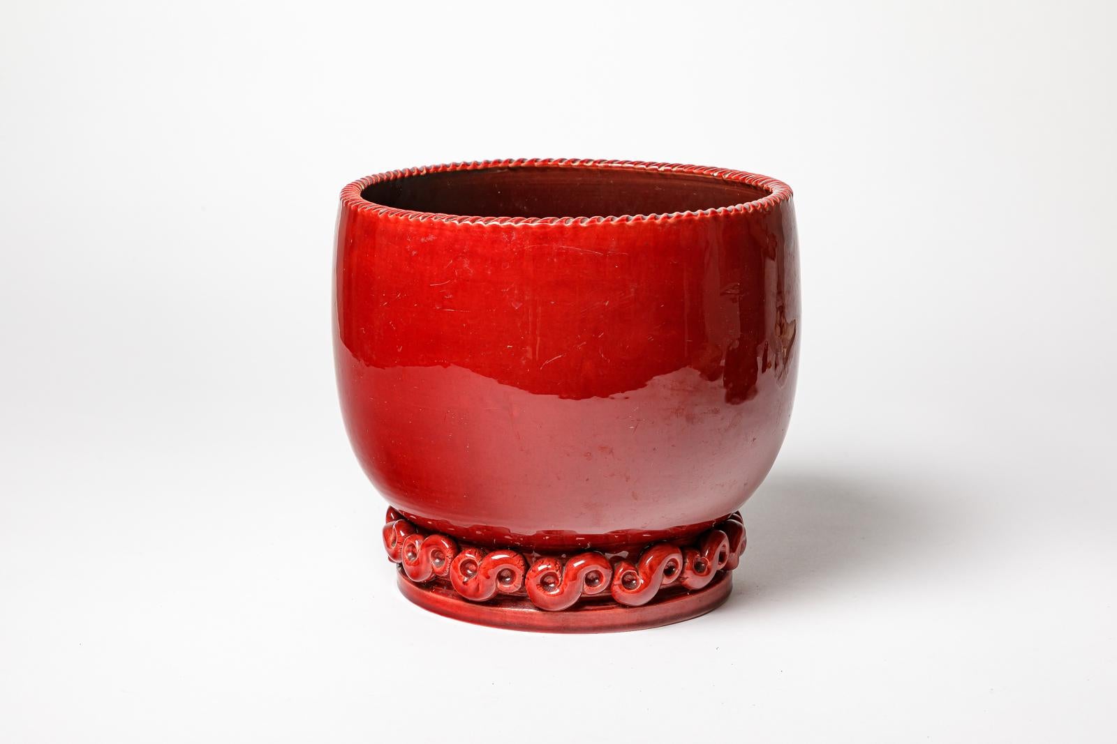 Jean Maubrou (1900-1965)


Large art deco ceramic cache pot or vase by Jean Maubrou

Art deco 20th century design

red ceramic glaze color

Signed under the base

Original perfect condition

Height 22 cm
Large 24 cm