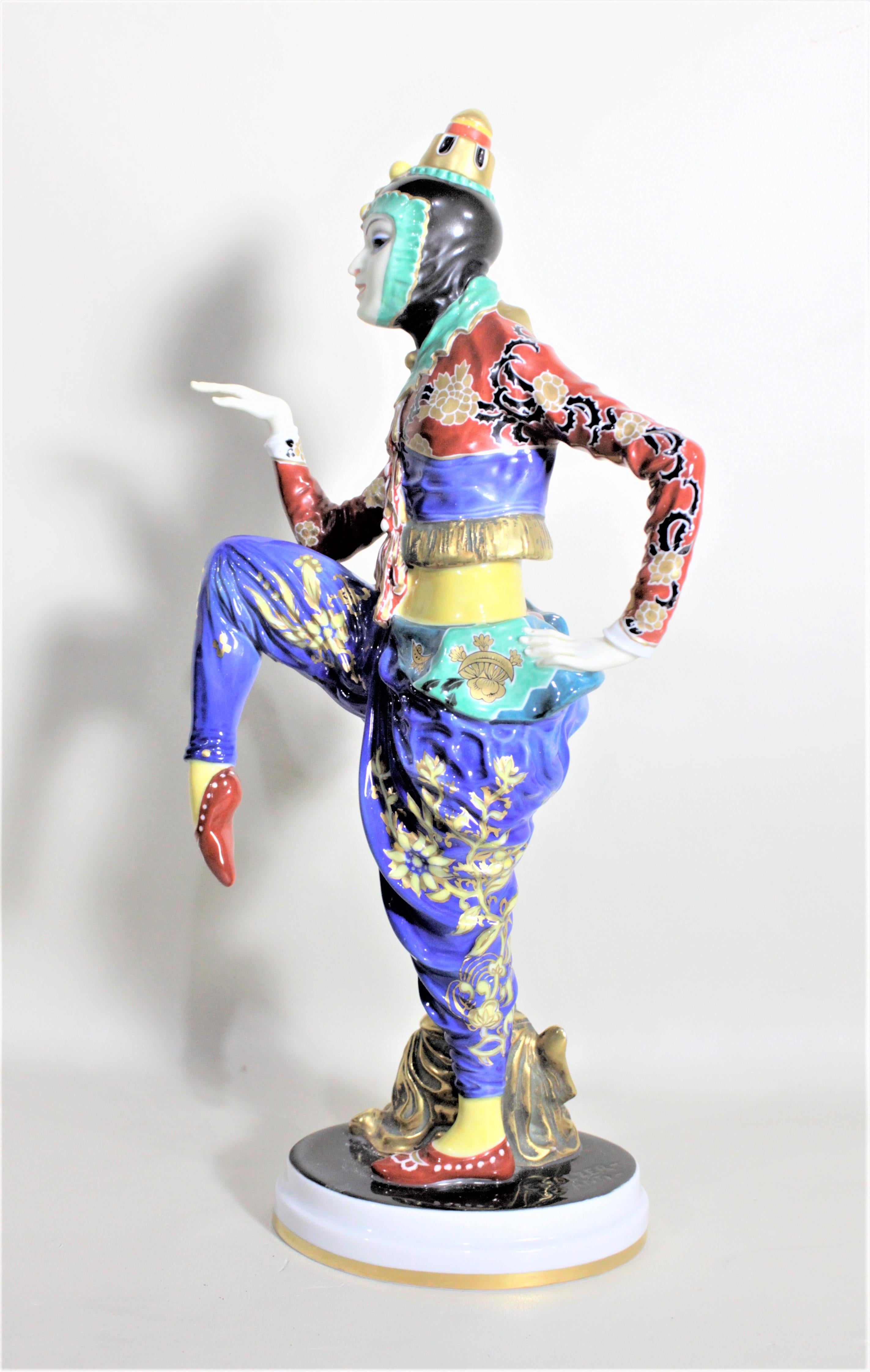 This large porcelain figurine was manufactured by the Rosenthal Porcelain Factory and is entitled 'Korean Dancer' and made in circa 1927 in the period Art Deco style. This figurine was designed by the Austrian sculptor Constantin Holzer-Decanti who