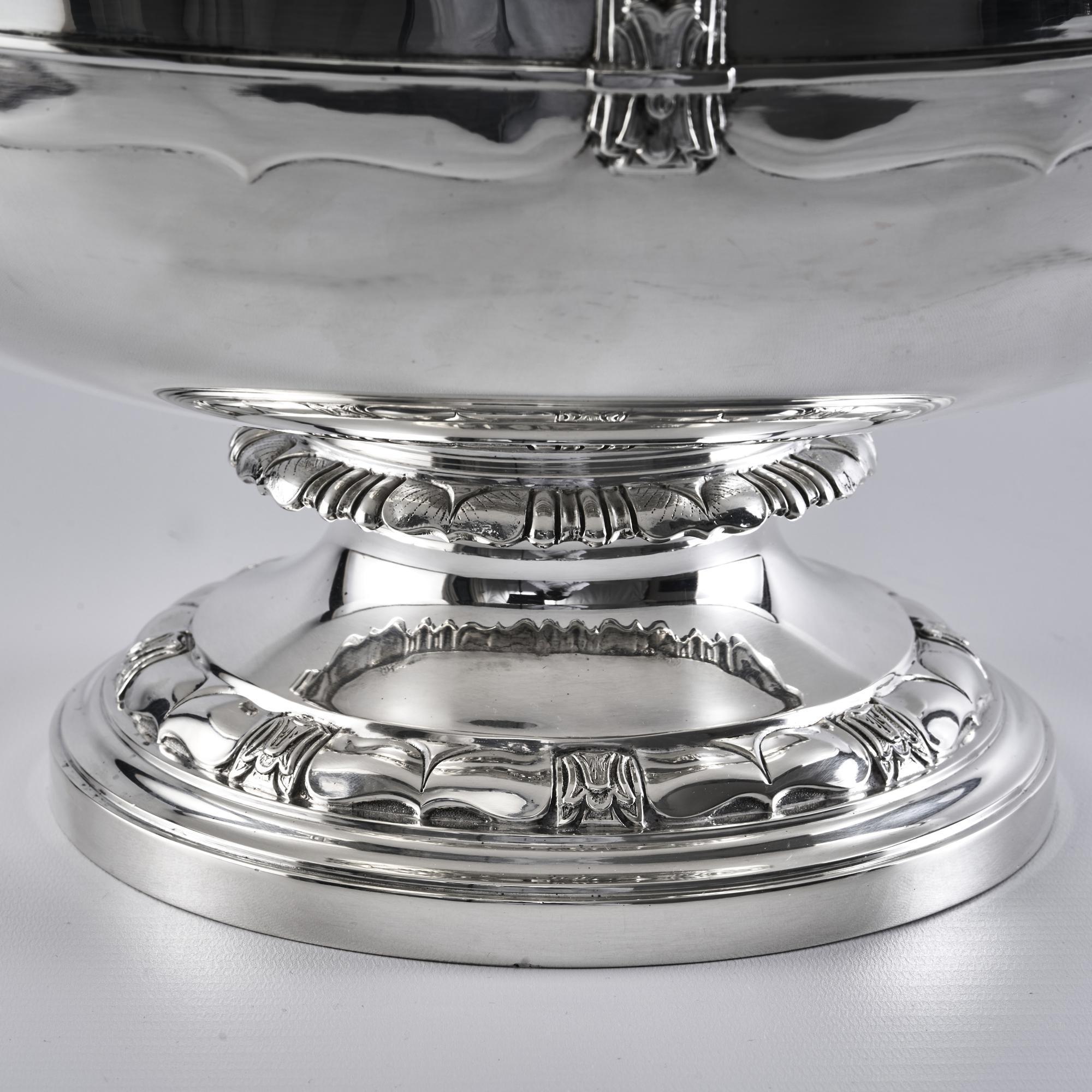 Excellent, large Art Deco style silver bowl centrepiece suitable either for displaying fruit or flowers but it would also make a fabulous presentation piece. 

The Art Deco styling and motifs can be seen around the body and base, as well as on the