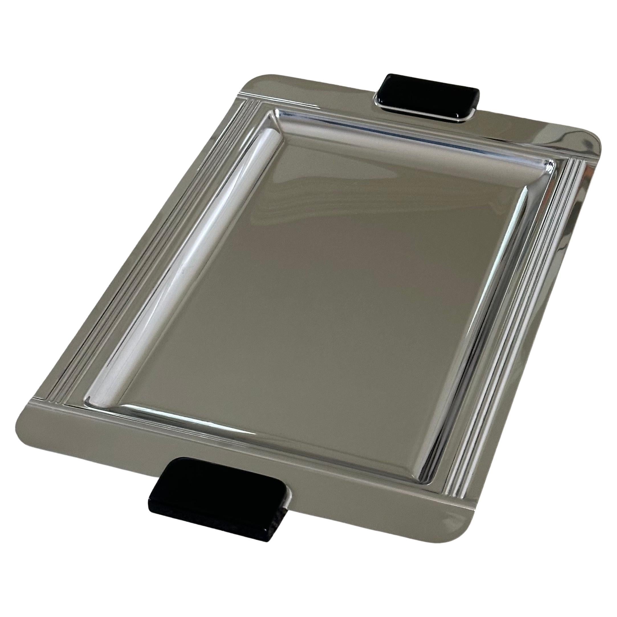 Gorgeous large art deco style stainless steel and black resin barware / serving tray by Jean Couzon of France, circa 1980s.  The modernity of this tray is nod to and of the Art Deco style with incised lines and rectangular black resin handles; great