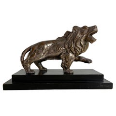 Grande sculpture Art Déco "Lions qui marchent", années 1930