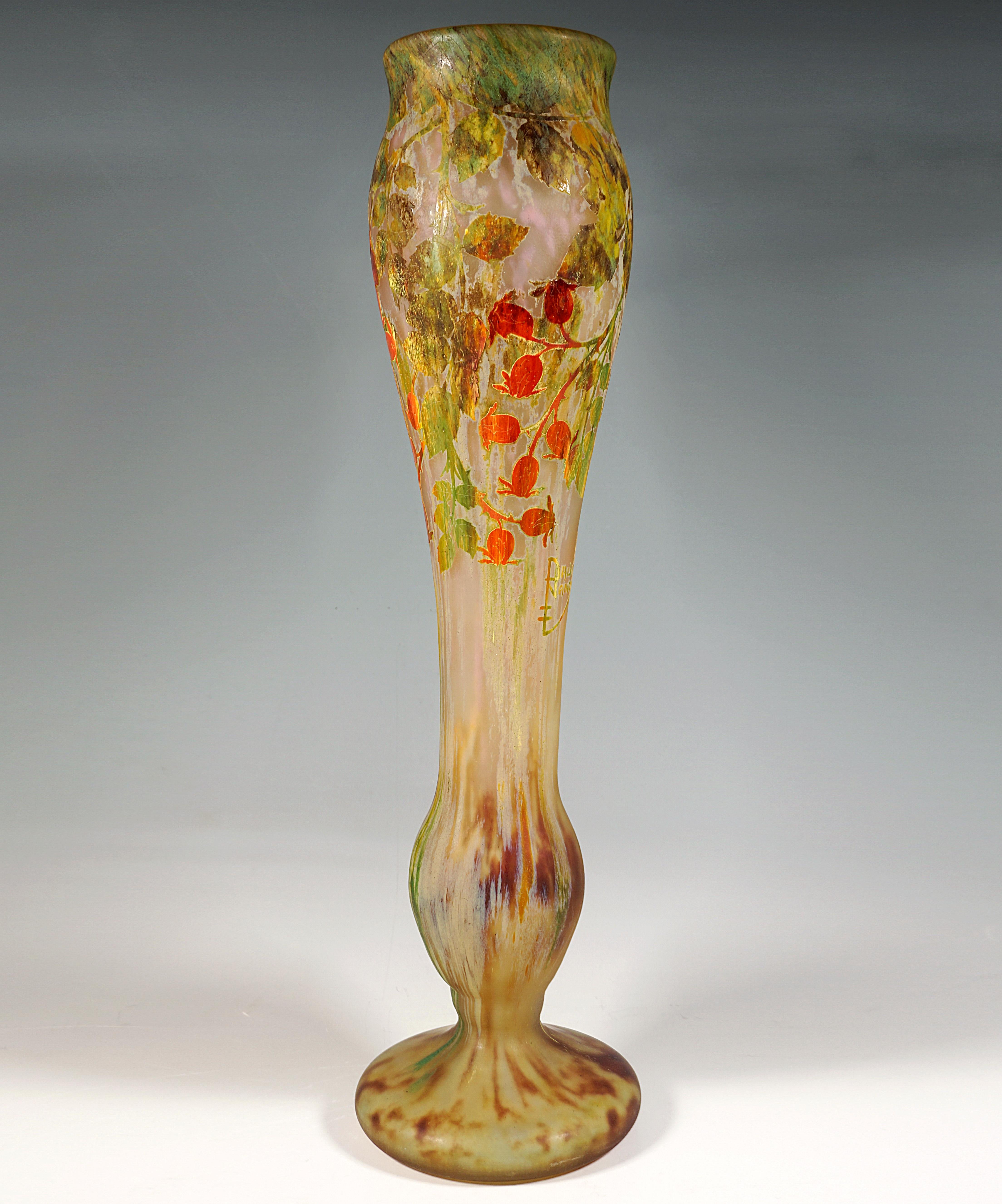 Large baluster vase on a separate foot, colorless glass with flaky white, yellow-green and brown colored powder inclusions, overlay in yellow, orange-red, green and brown, rosehip decoration etched in several stages, satin-finished surface in the