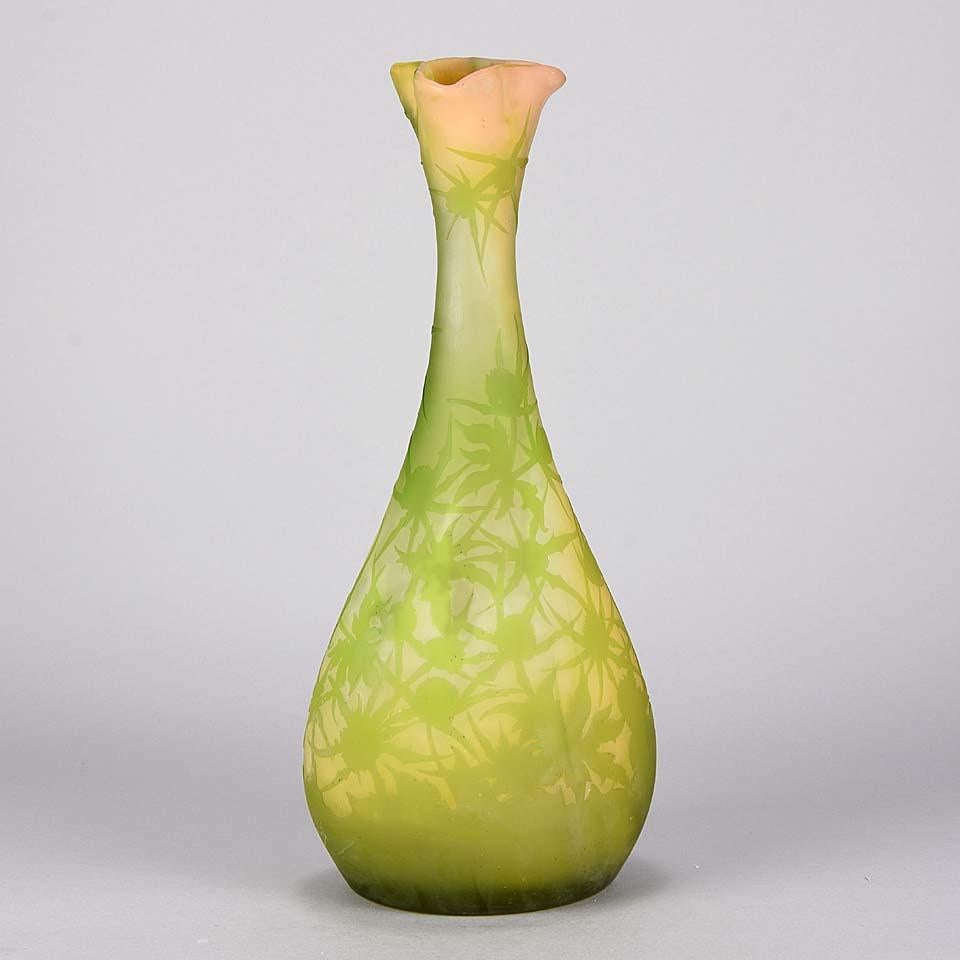A fabulous Art Nouveau cameo glass vase acid etched with a lime green thistle decoration against a deep yellow background with very fine color and good hand finished detail, signed Gallé in engraved script.


Emile Gallé (French, 1846 ~ 1904)  born