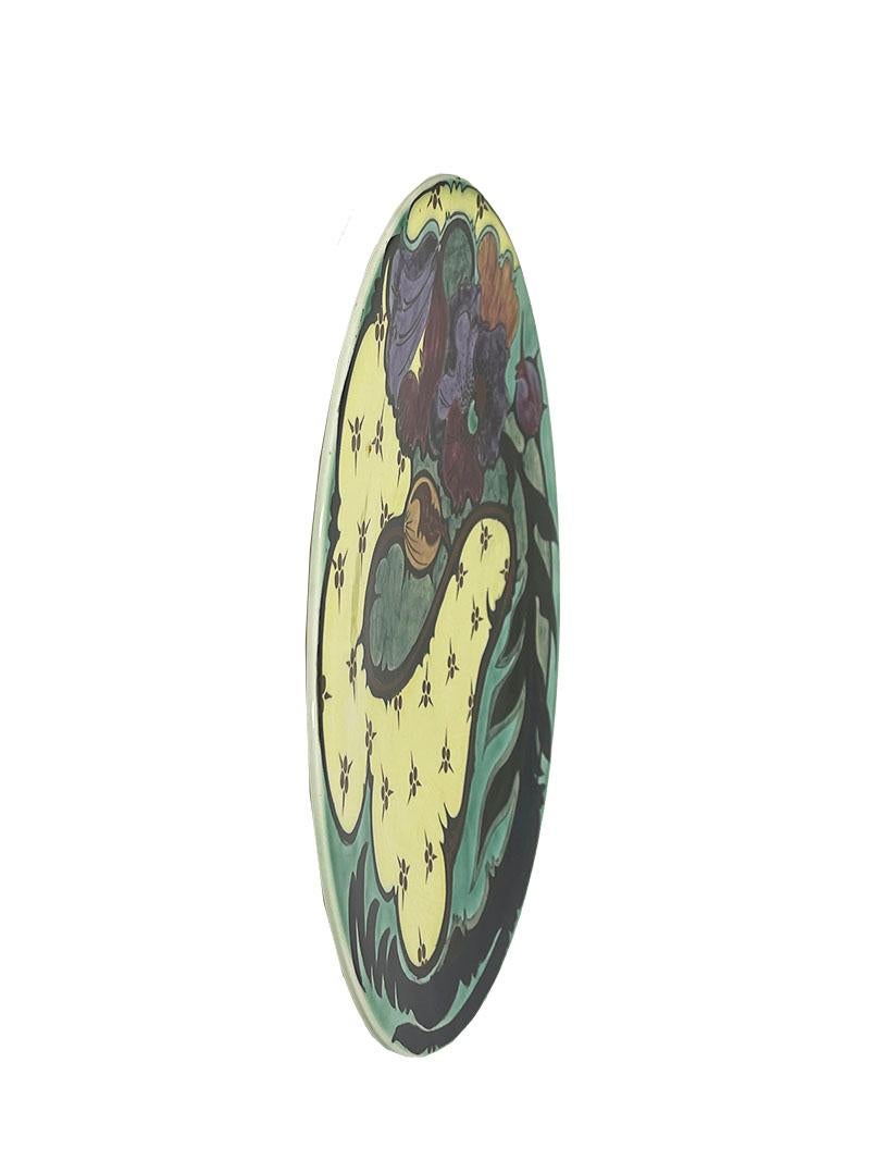 Large Art Nouveau Gouda Zuid Holland Plateel charger, 1901-1903

A ceramic charger measuring 38 cm diagonal, made in the Netherlands by Gouda Zuid Holland Plateelbakkerij. Designed by Theo Verstraaten, who worked there from 1901 to 1903. The mark of