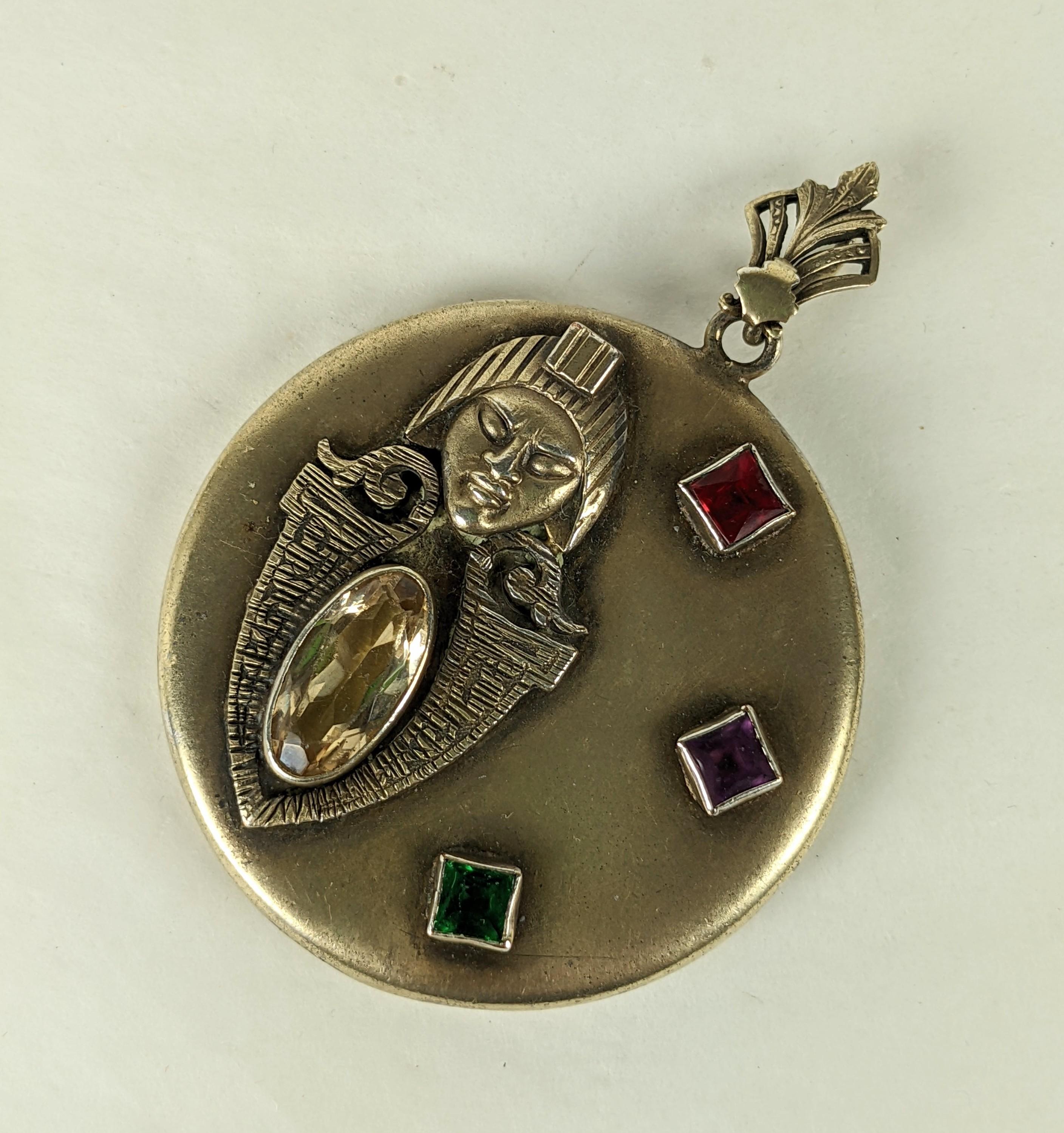 Unusual and large Art Nouveau Revivalist Jeweled Locket from the 1920's. Large in scale with bezel set glass 