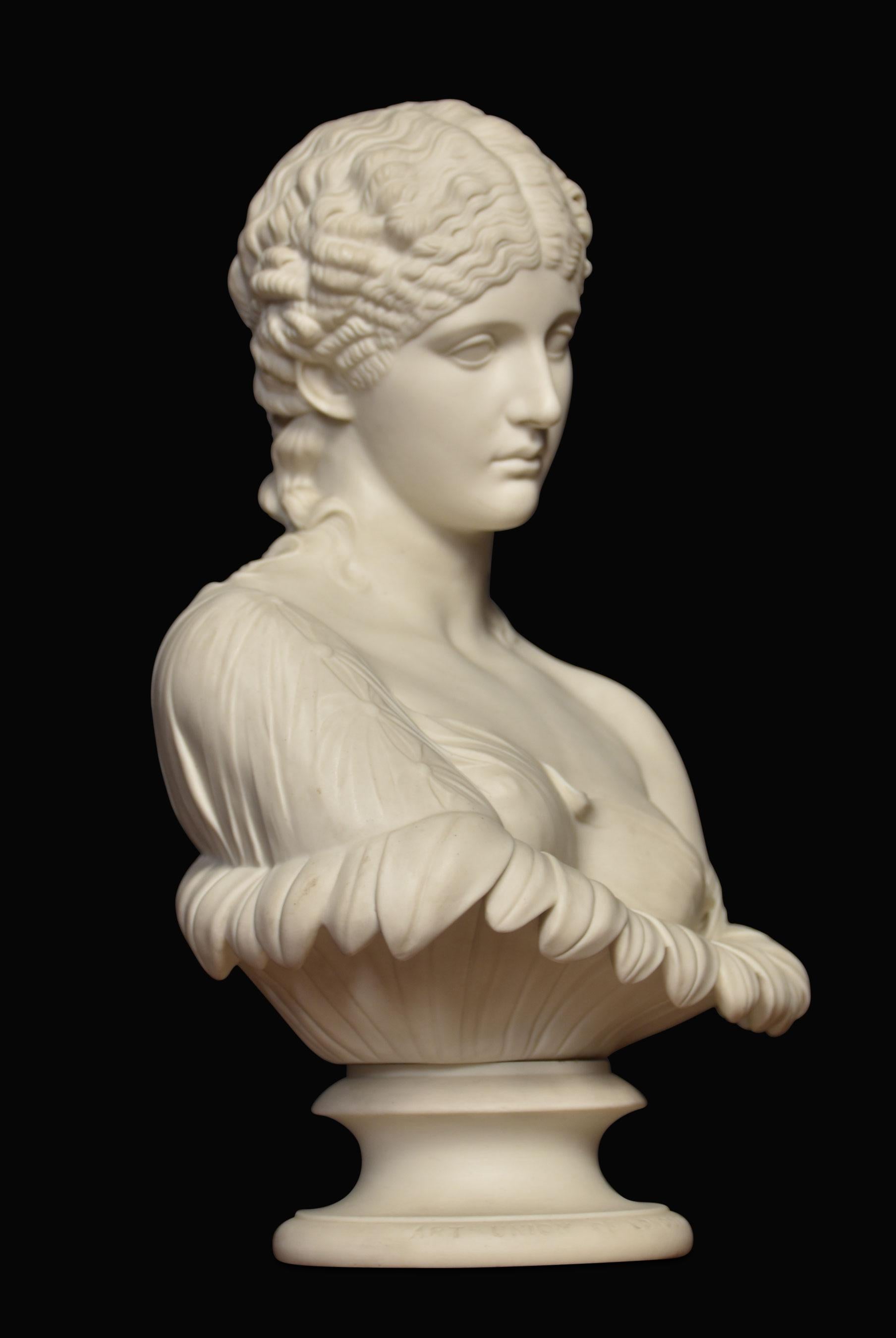 A large Art Union Parian bust depicting Clytie raised up on circular stepped base.
Dimensions
Height 13.5 inches
Width 10 inches
Depth 5.5 inches.