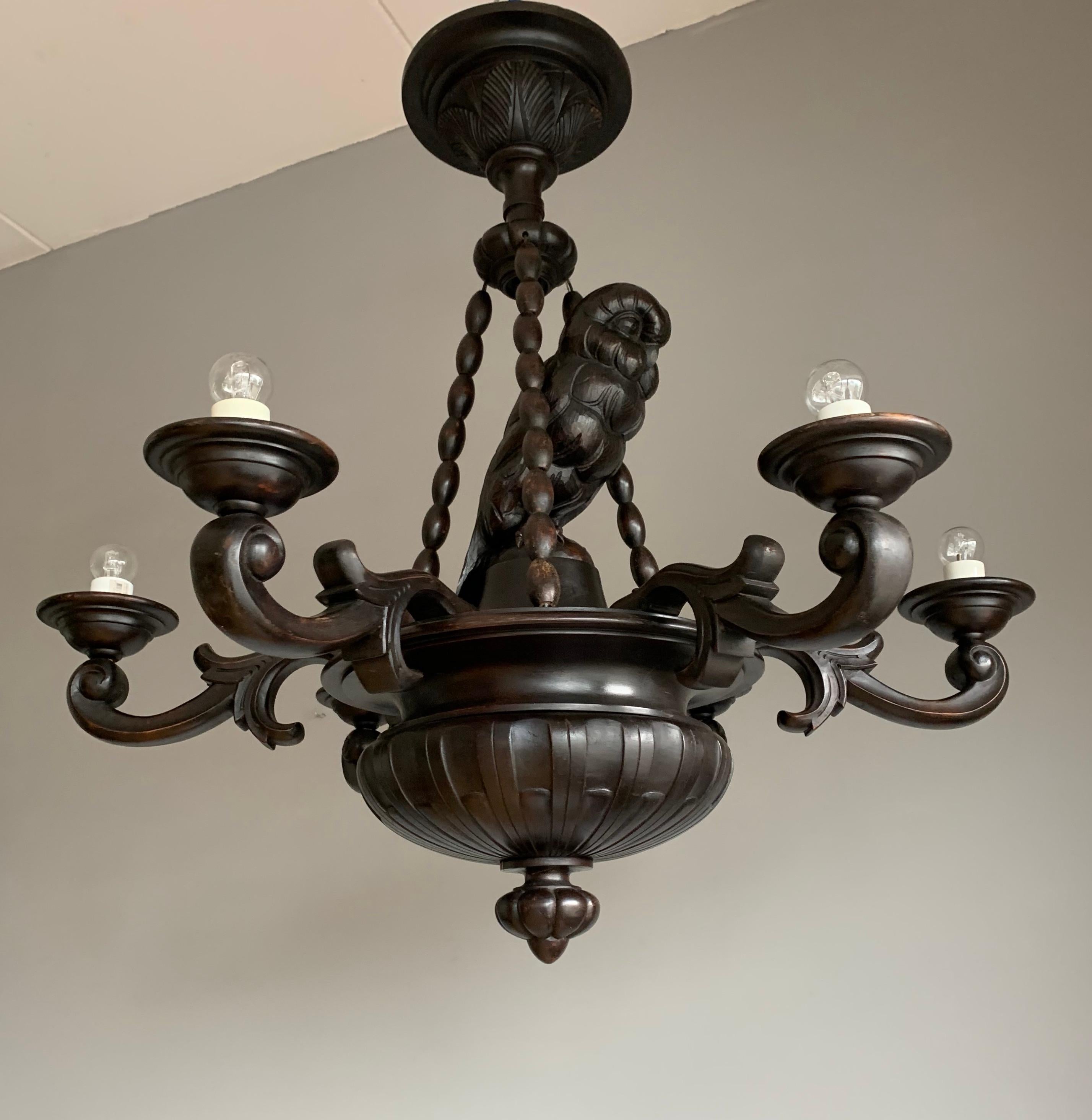 One of a kind and superb condition, extra large ( diameter 38.6 inches) pendant light.

If you have a passion for sculptural and meaningful Art then this antique and fully hand carved owl chandelier could be flying your way soon (no pun intended).