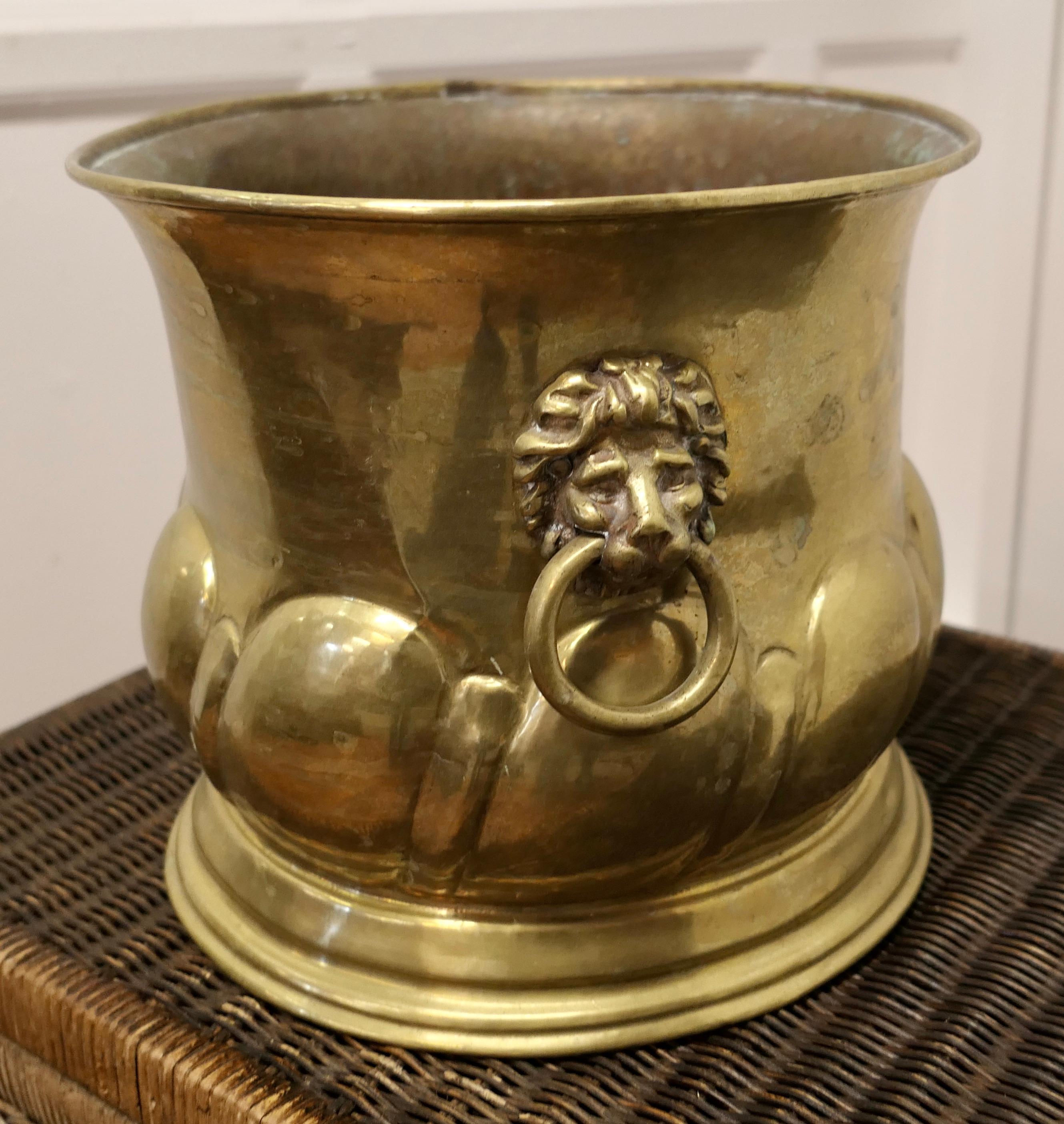 Late 19th Century Large Arts and Crafts Brass Jardiniere with Lions Mask Handles For Sale