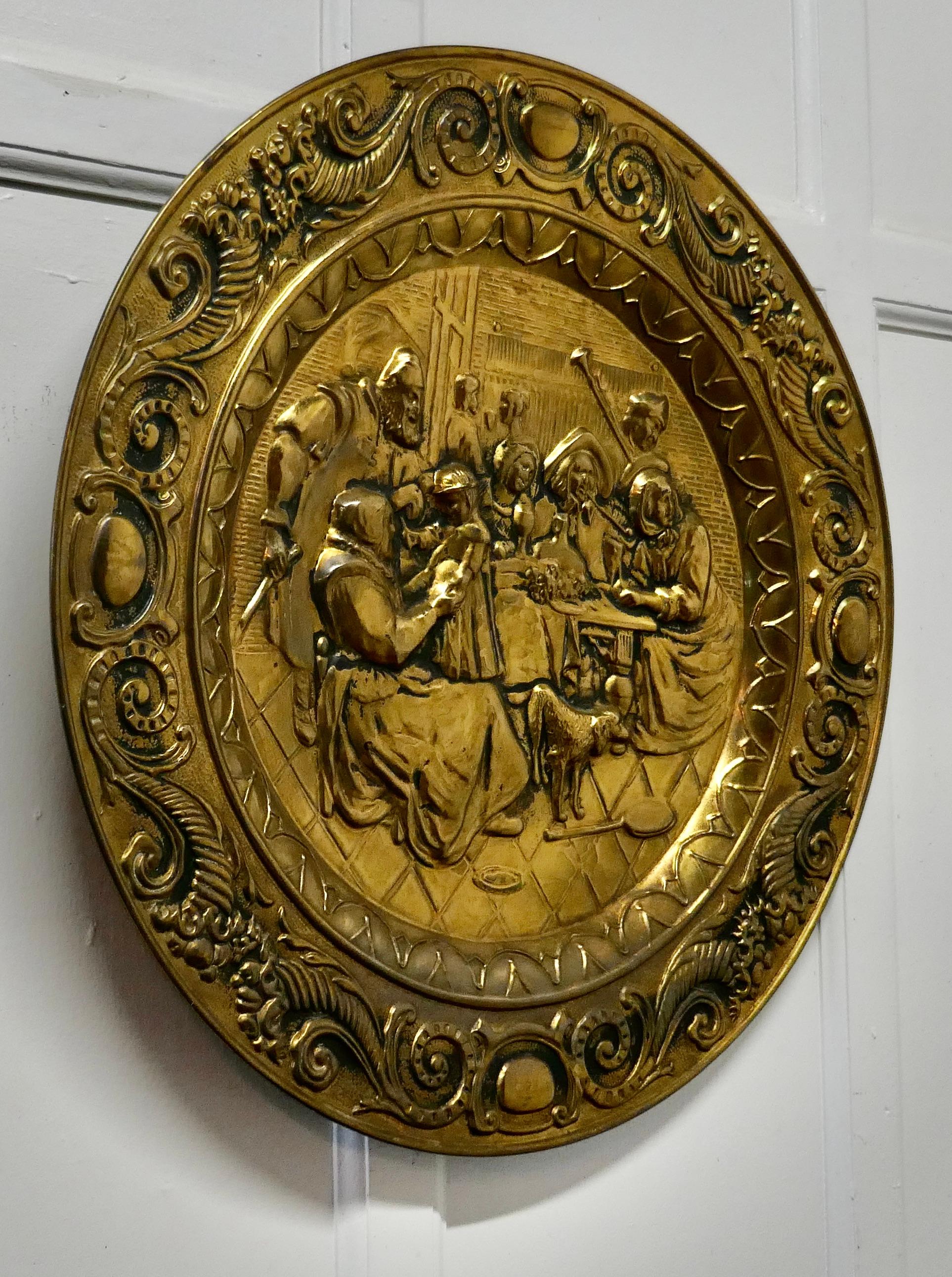 20th Century Large Arts & Crafts Embossed Brass Wall Hanging Charger For Sale