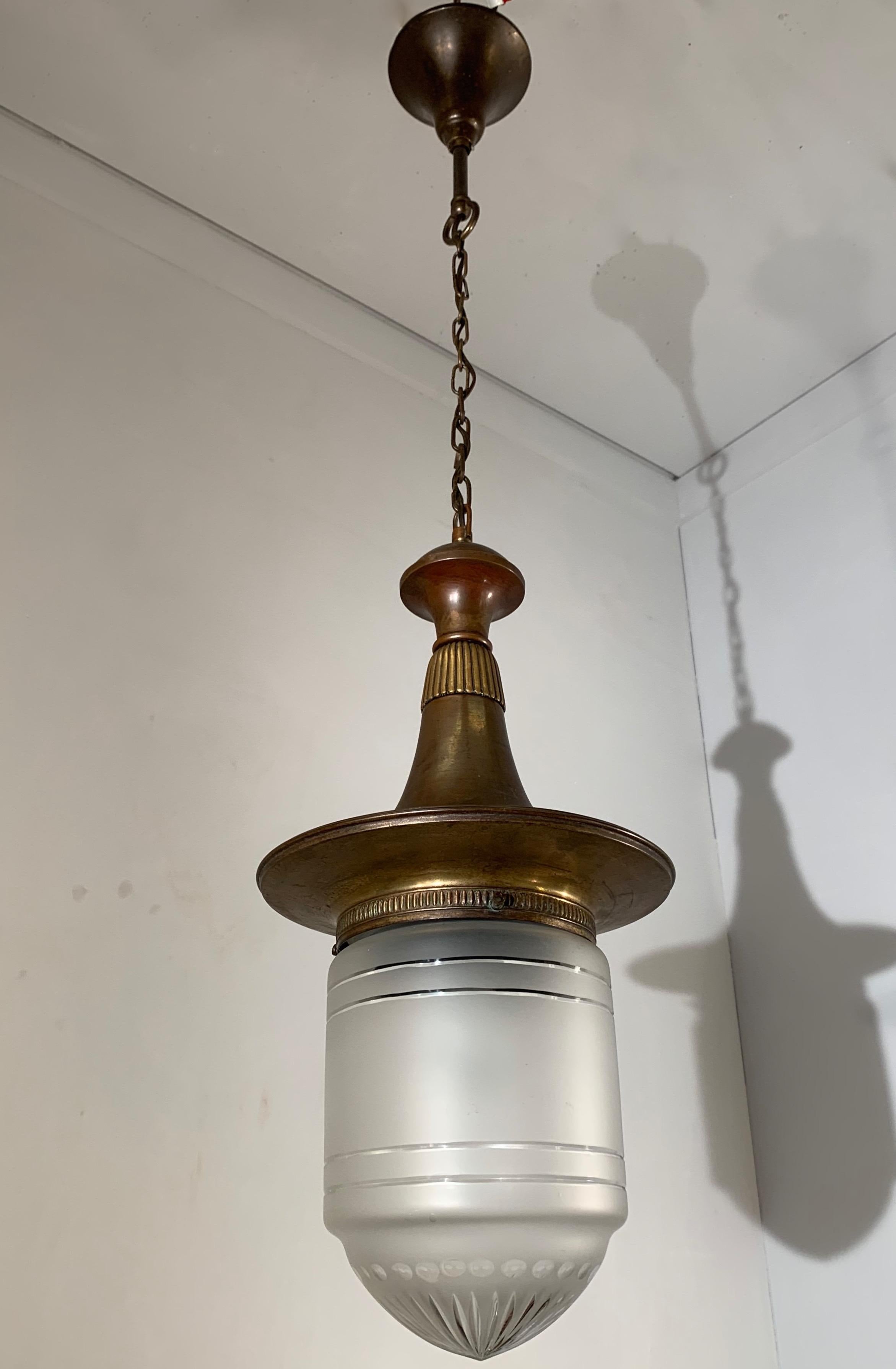 Good size handcrafted light fixture.

If you have an Arts & Crafts house or if you are a collector of this sophisticated, early 20th century style then this unique pendant could be gracing your living space soon. With the Arts and Crafts era being