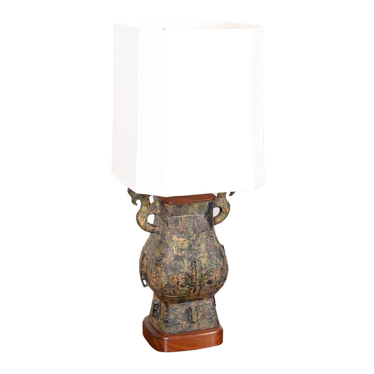 Large Asian-Inspired Walnut Accented Table Lamp

Additional information:
Material: Walnut
Very large MCM pottery lamp has an Asian influence in its shape. A great statment piece.

Dimension: Ø 8? x H 23?