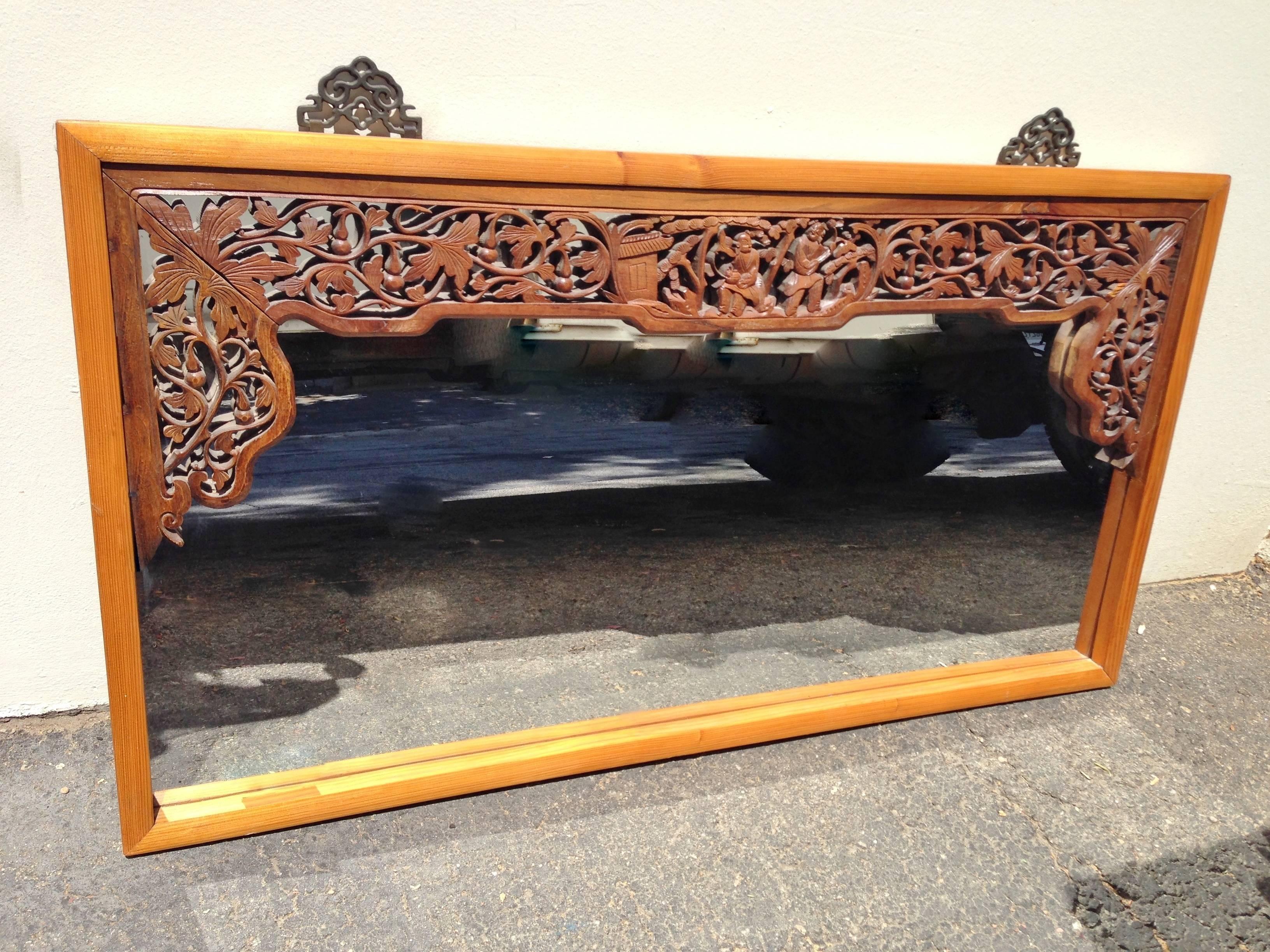 Our beautiful mirror is made with antique carved screen. The Chinese harmony gods 