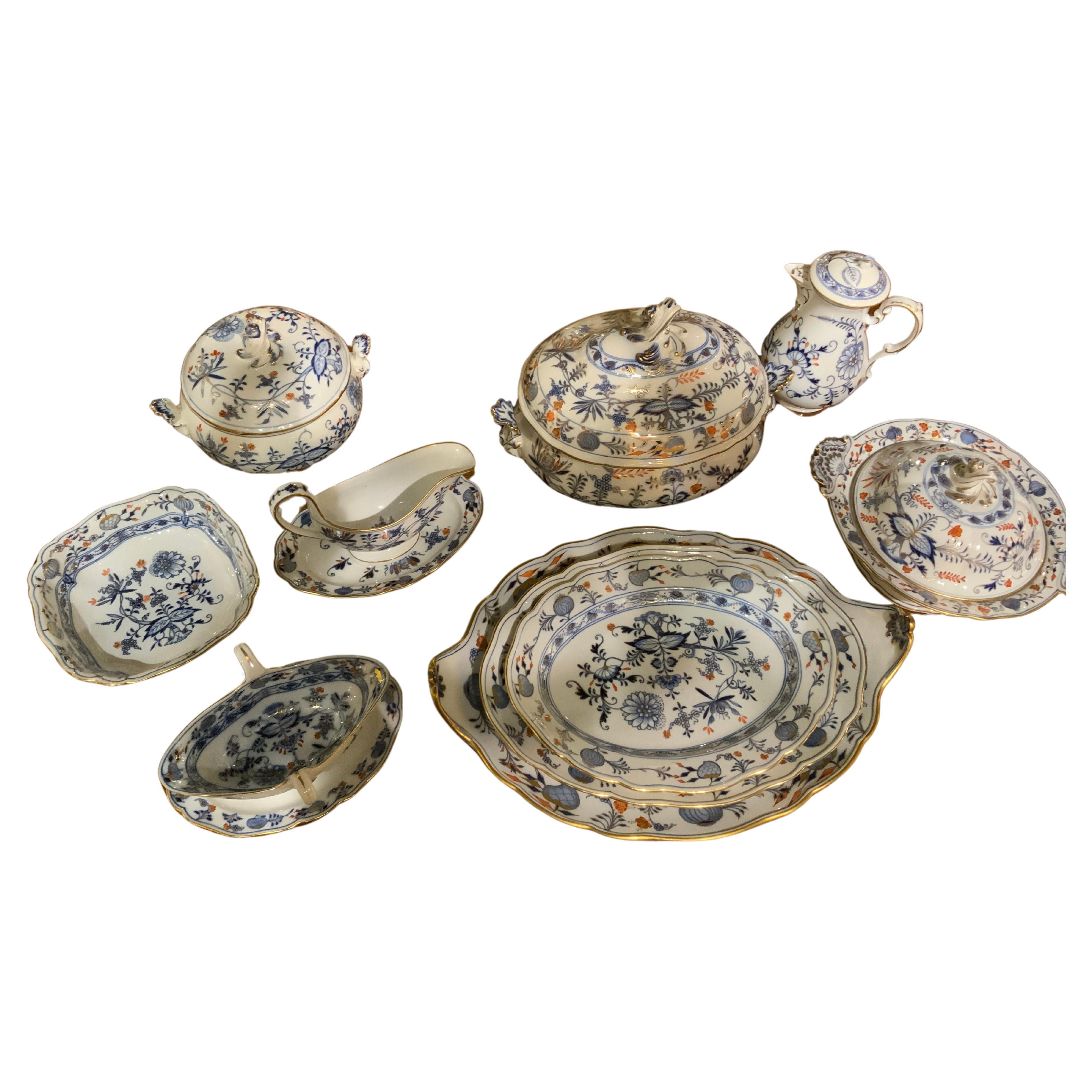 Large assembled set of blue onion Meissen with red flower 107 pieces