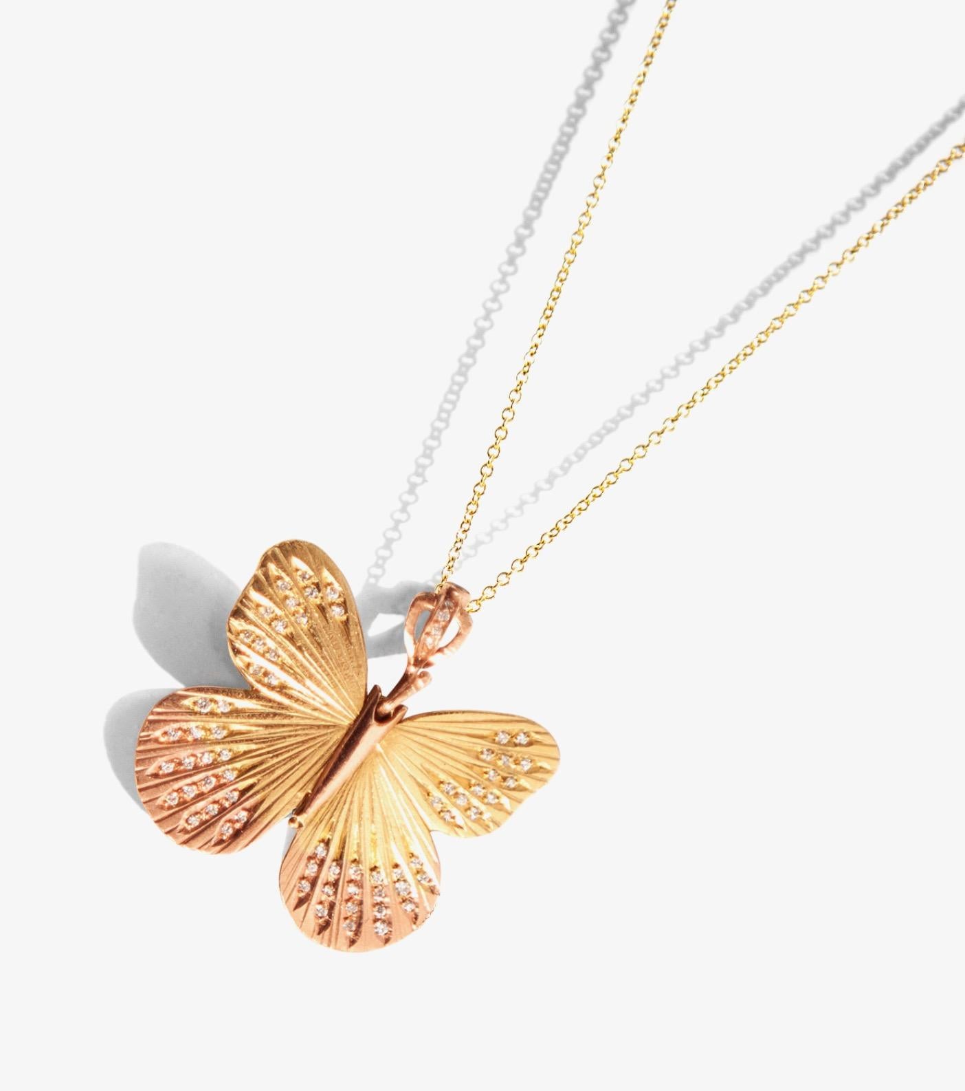 James Banks's signature butterfly necklace features a Large Asterope butterfly with a hinge at the center to allow movement of the wings, set in 18k Yellow Gold with 14k Rose Gold inlay and accents and pave white diamonds throughout and white