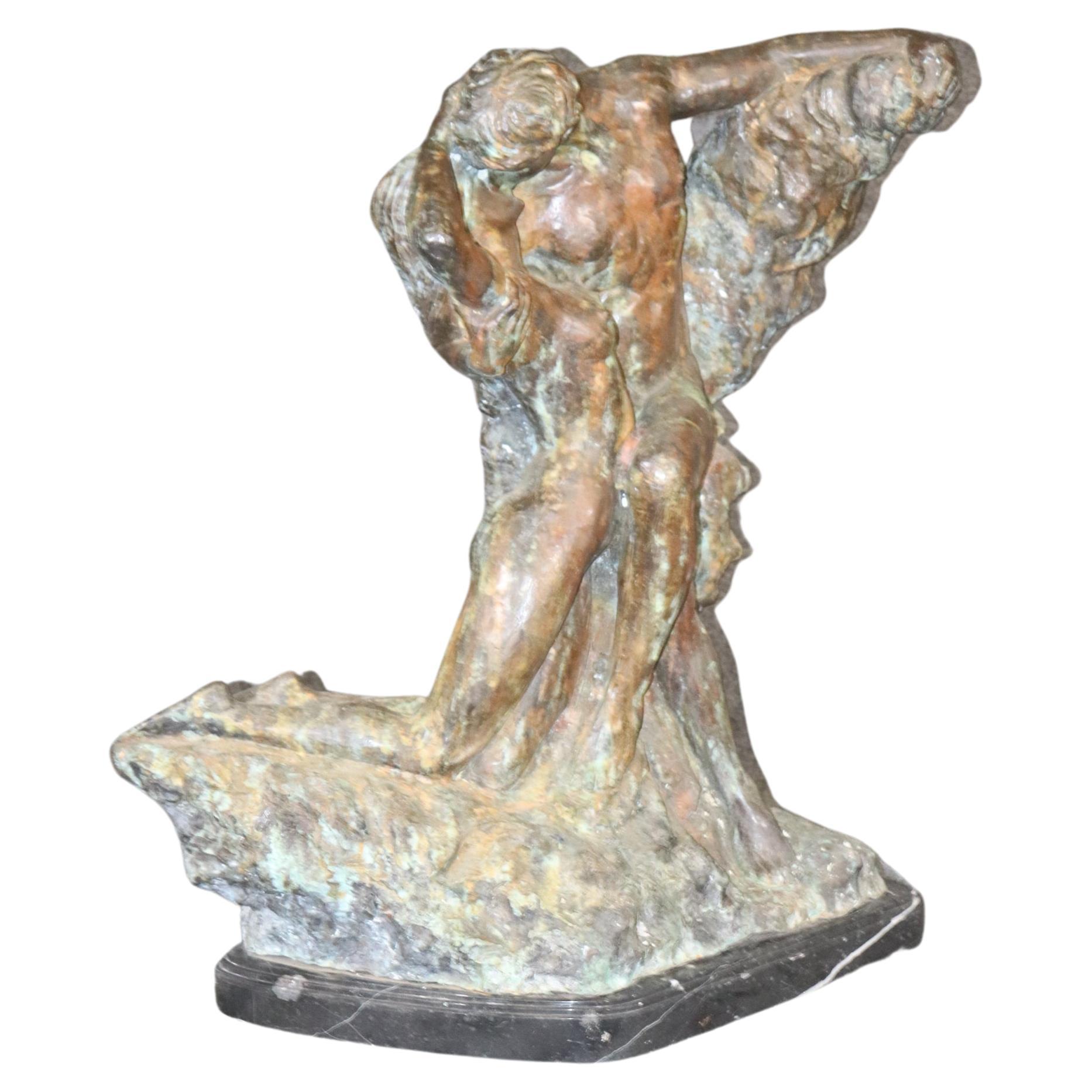 What is the name of the famous bronze sculpture of a man created by Auguste Rodin?