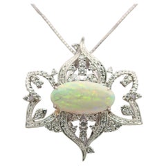 Grand pendentif en cristal australien, opale, diamant et platine