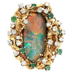 Großer australischer Lichter-Ring aus 14 Karat Gelbgold mit Opal, Smaragd und Diamant