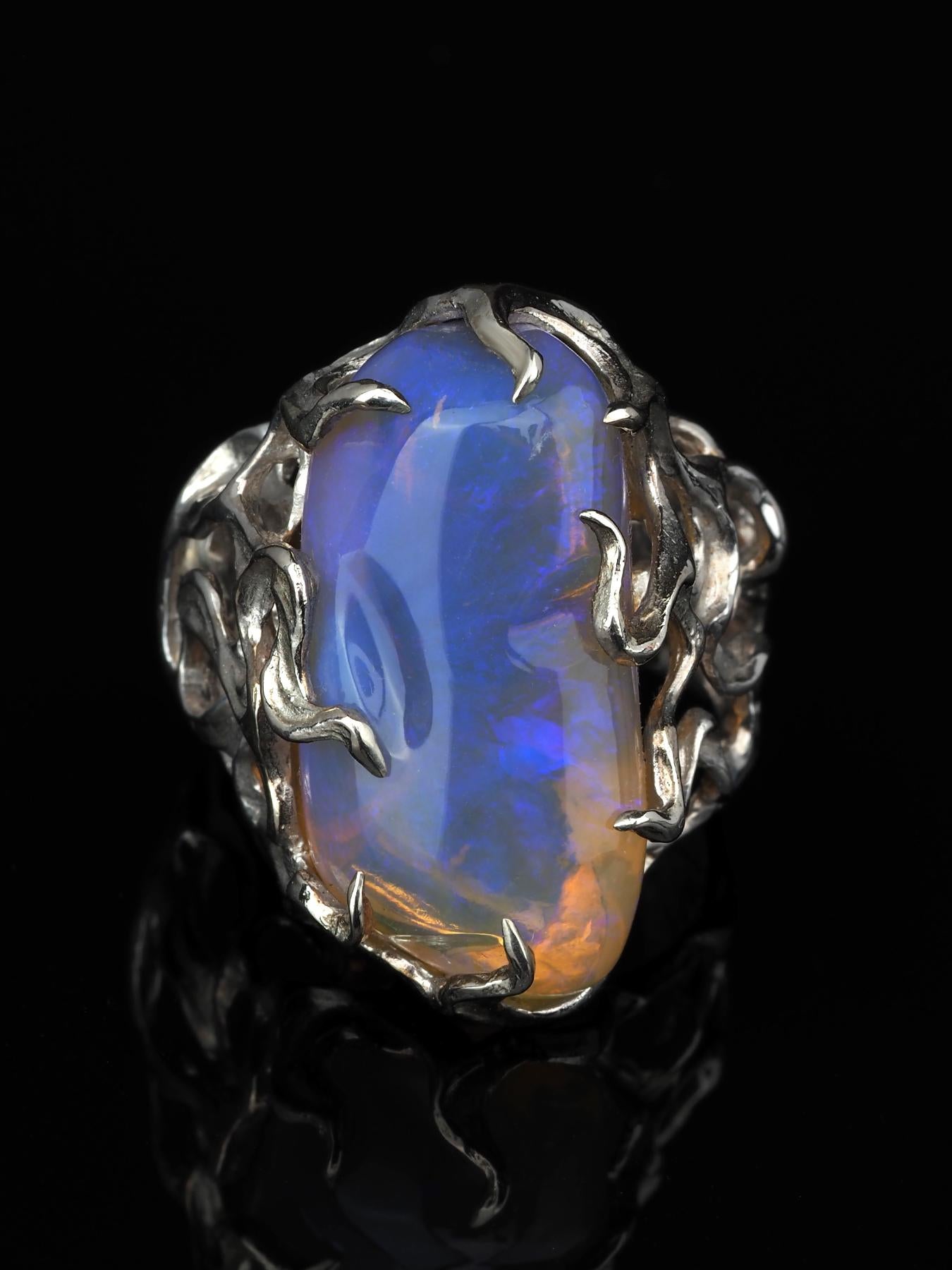 Silver ring with natural freeform Neon Opal 
opal origin - Australia
opal measurements - 0.39 x 0.51 x 0.98 in / 10 х 13 х 25 mm
opal weight - 20.10 carats
ring size - 7.5 US (we can resize) 
ring weight - 13.72 grams

Waves collection


We ship our