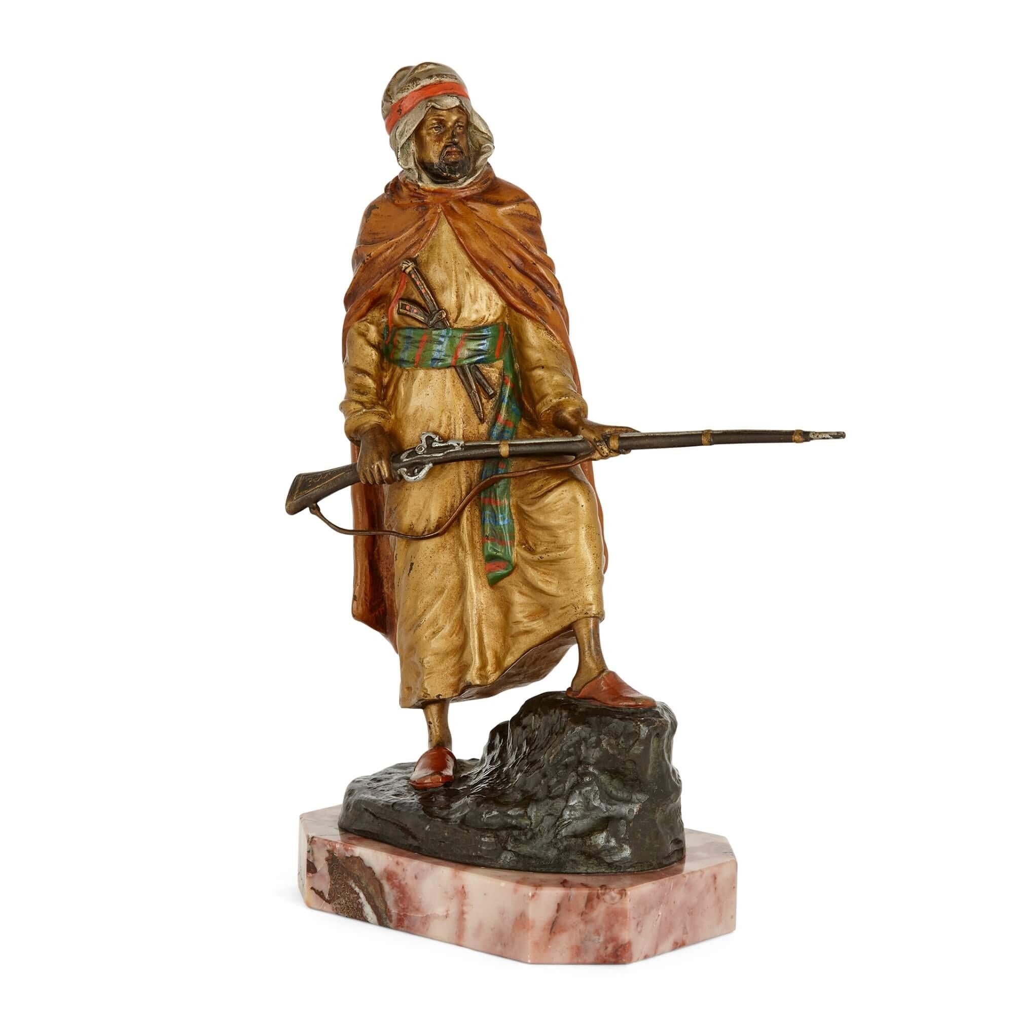 Large Austrian figurative cold-painted bronze sculpture
Austrian, c. 1910
Height 25cm, width 17cm, depth 9cm

This cold-painted bronze sculpture depicts an Arab soldier in a defensive position, dressed in typical Orientalist robes. The vibrant