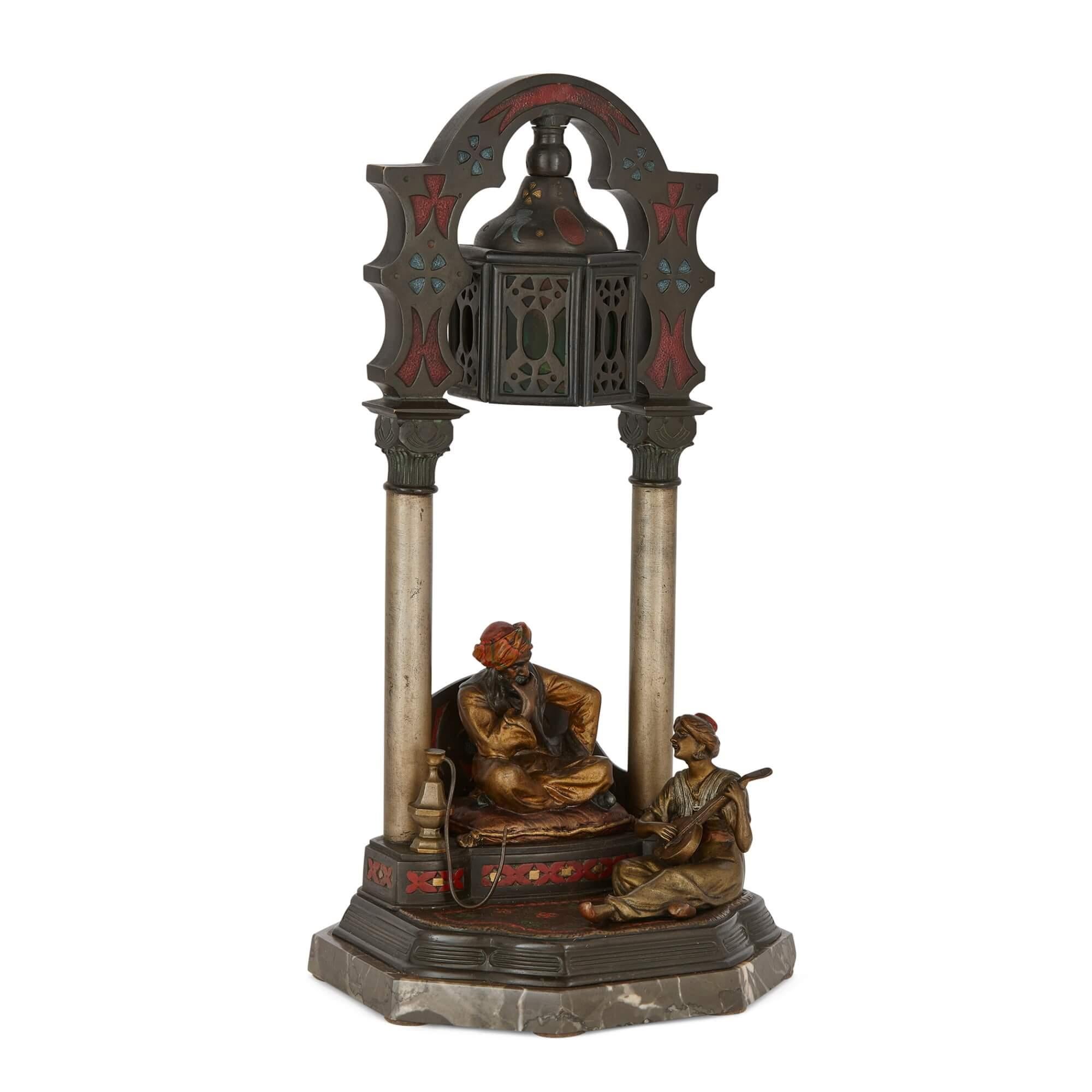 Large Austrian Islamic-style cold-painted bronze lamp
Austrian, Early 20th Century
Height 39cm, width 19cm, depth 17.5cm

Drawing upon the mystical allure of early 20th-century Orientalist designs, this Viennese bronze lamp serves as a magnificent