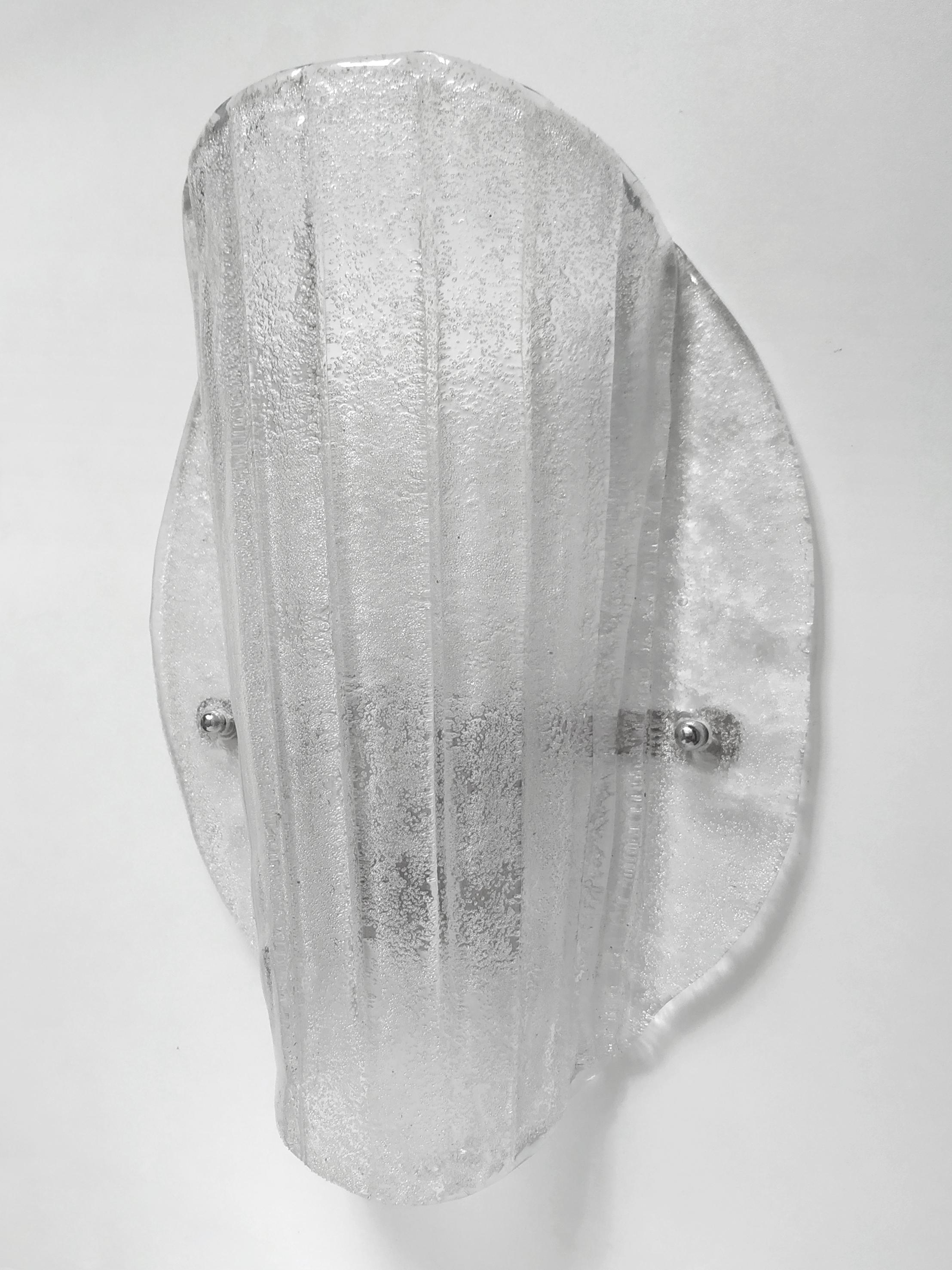 Large Murano clear ice glass sconce.
Austria, 1960s.


 