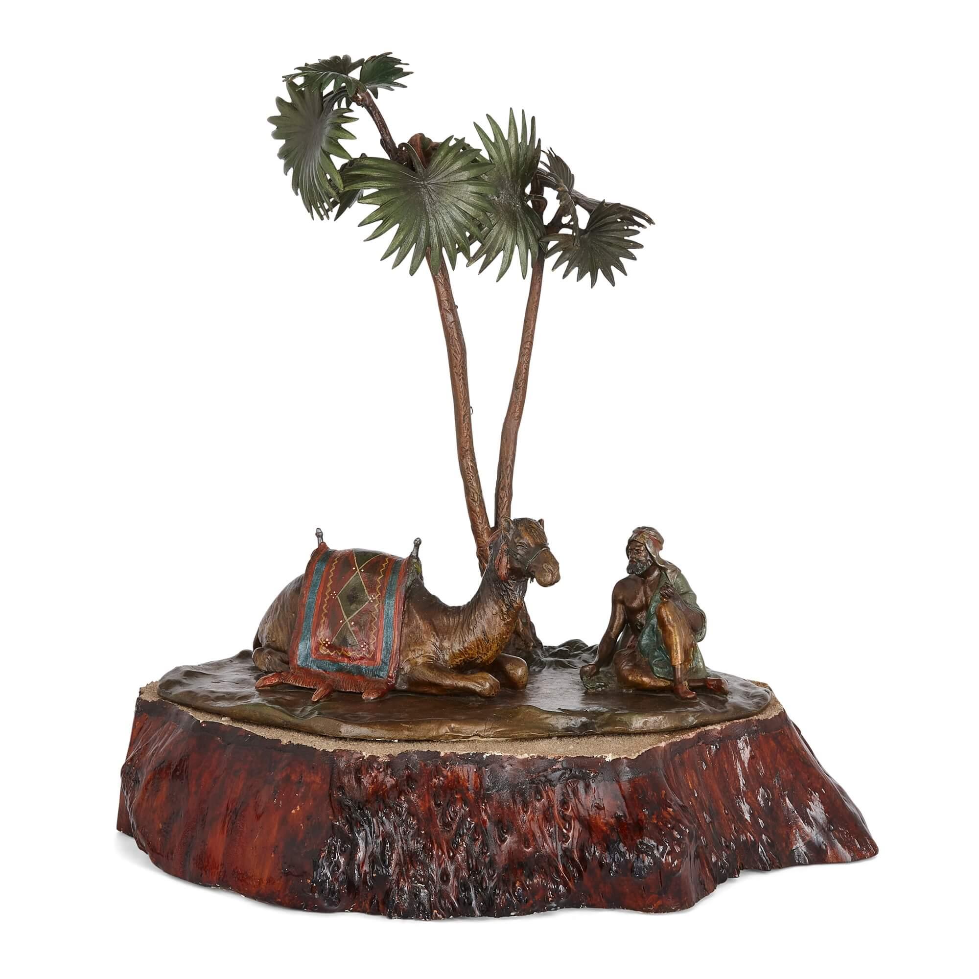 Large Austrian wood and cold-painted bronze lamp 
Austria, c. 1910
Height 42cm, width 41cm, depth 30cm

This Orientalist lamp is an unusual example of the cold-painted bronze designs that were flourishing in Vienna at the turn of the 20th century.