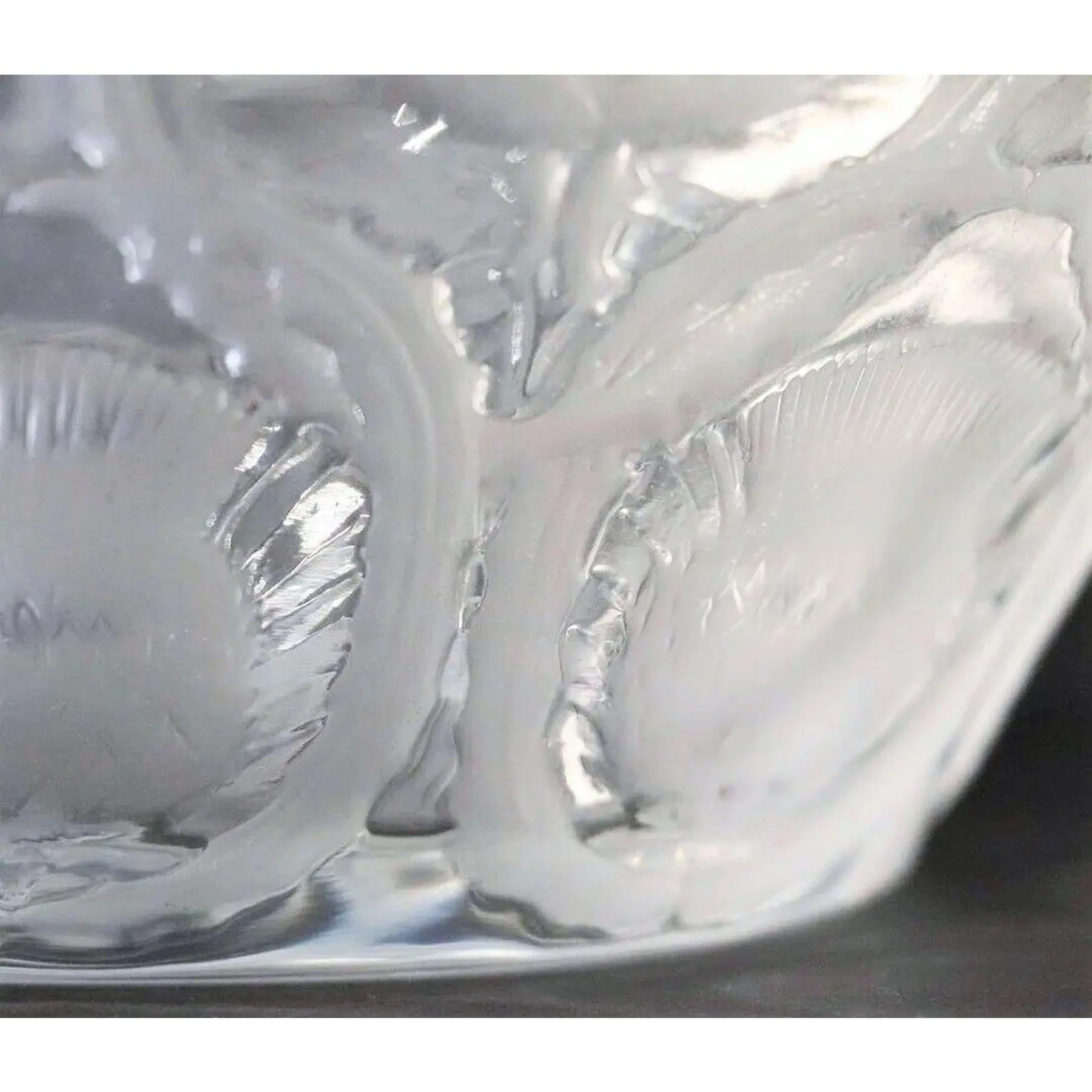 Glass Lalique Thistle Bowl.  No damage perfect condition. 
  Size: 4.75h x 10.25diaSigned Lalique France.
Besutiufl design and very decorative.