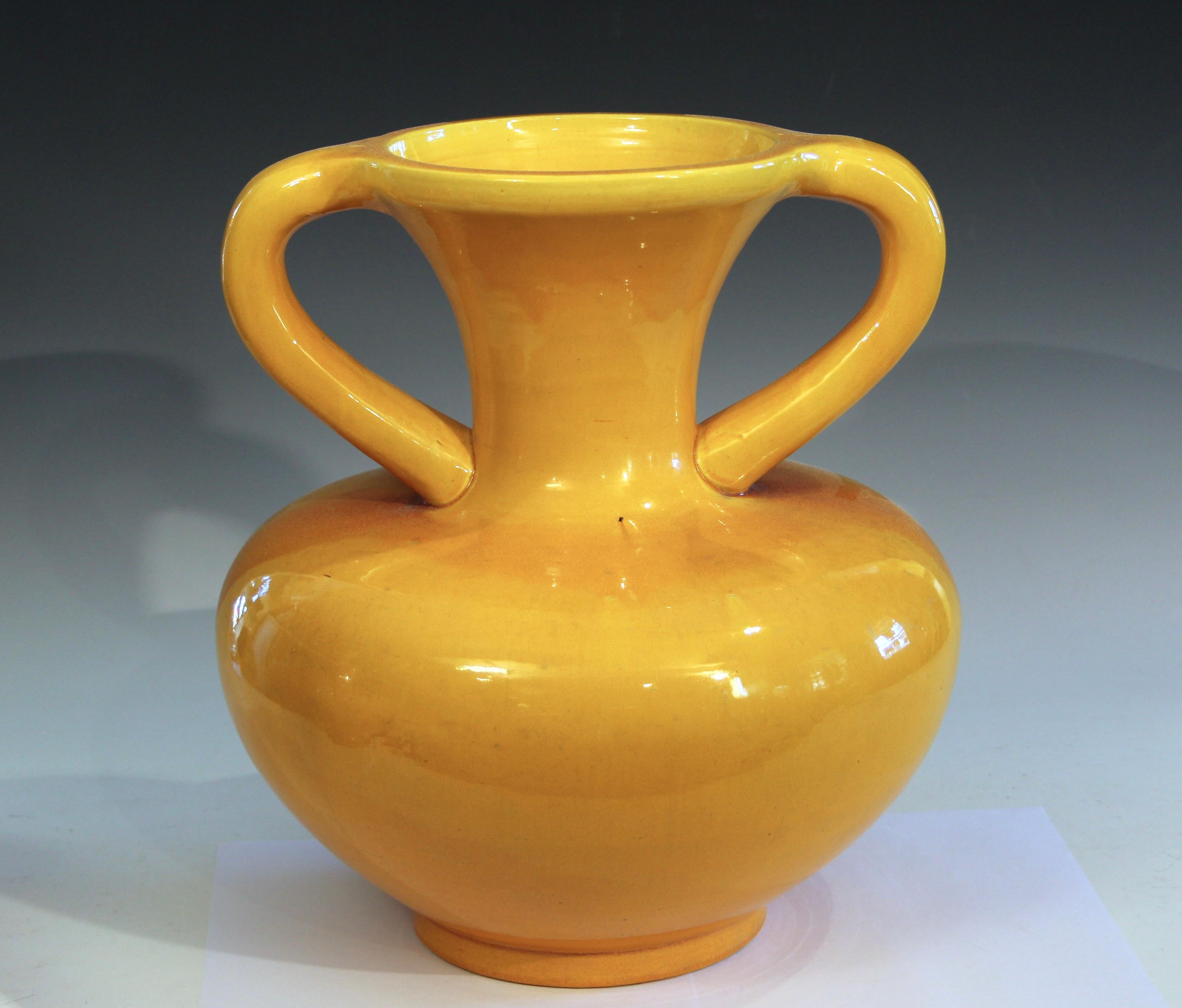 Large Awaji pottery Arts and Crafts vase in drawstring purse form with golden yellow monochrome glaze, circa 1920. 14