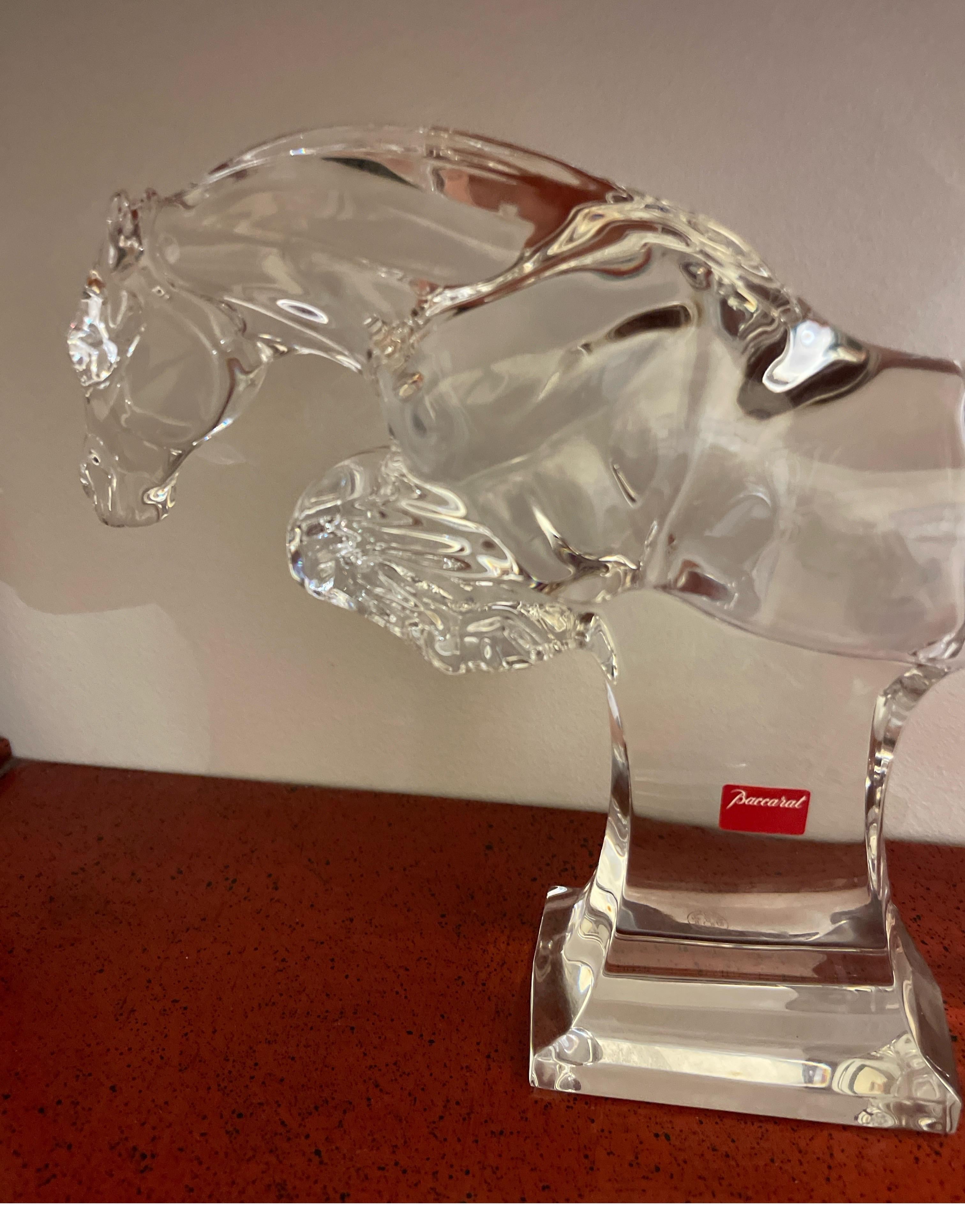 Large Baccarat Crystal Jumping Horse Sculpture. A beautiful addition to your collection or a stand alone piece.