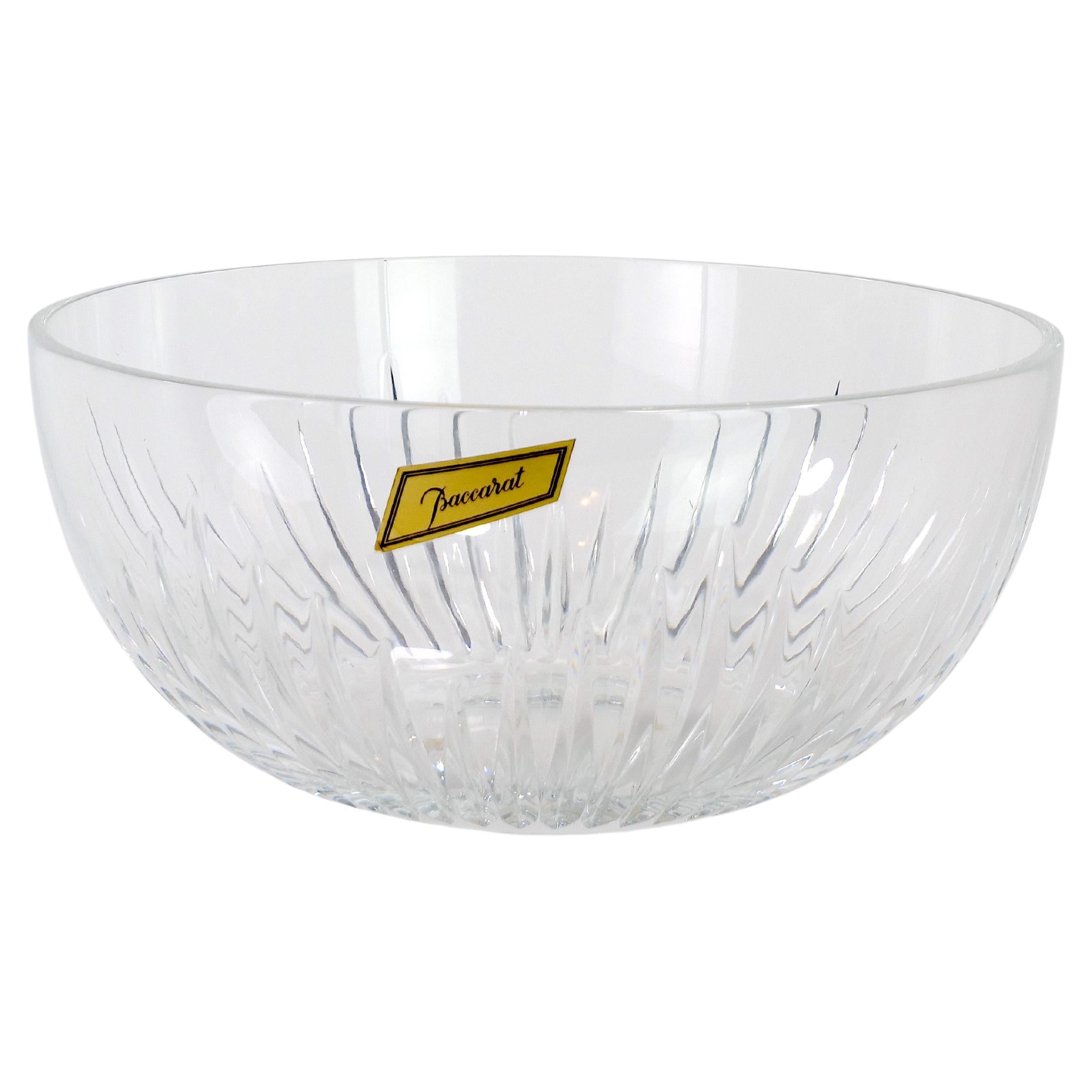 
Beautifully hand carved in a very deep orgue bevel cuts and deeply etched directly into the clear crystal, irradiating along the ample rounded globe towards the base. Their intricacy, in turn, put the smoothness and lucidity of the upper bowl into