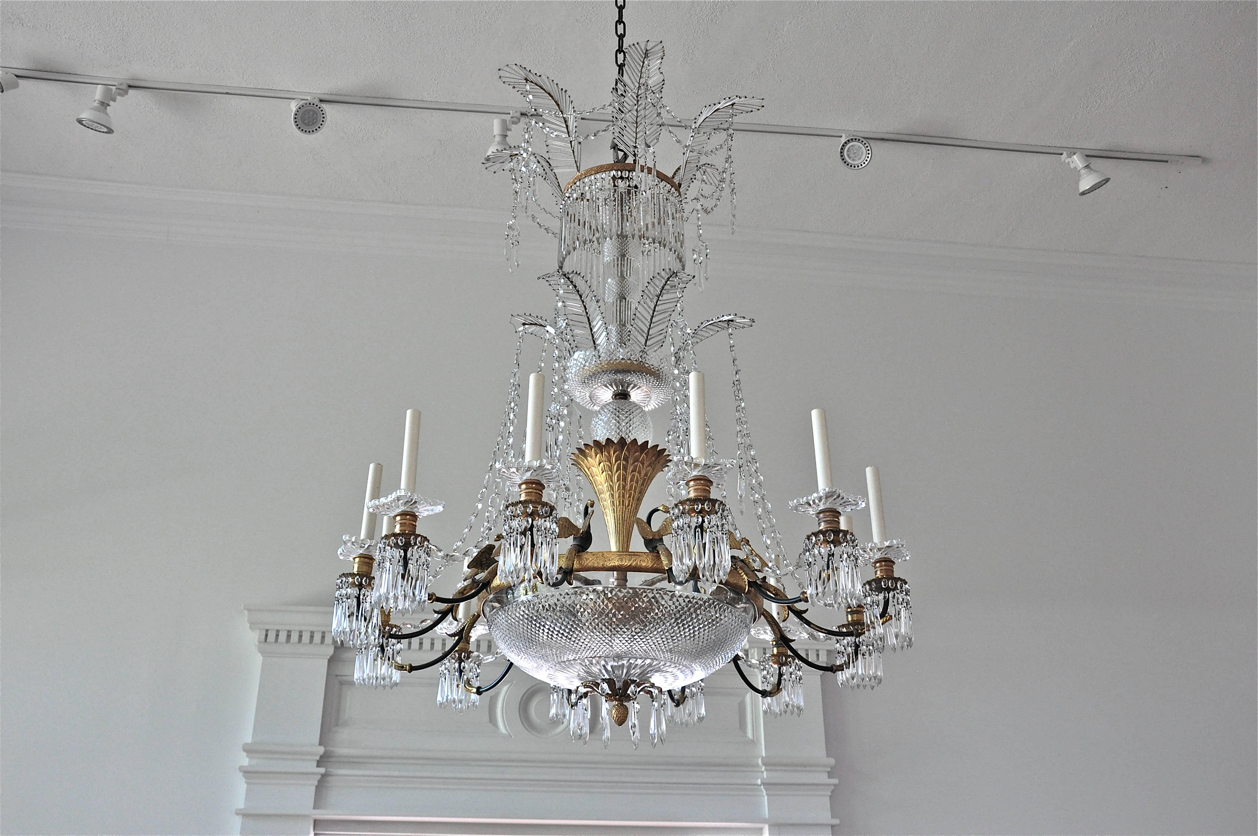 Exquisite French Empire style gilt bronze and crystal neoclassical chandelier, Signed Baccarat

Large antique French Empire style, twelve-arm bronze and crystal three-tiered chandelier. Scroll work to gilt bronze frame with figural phoenix birds